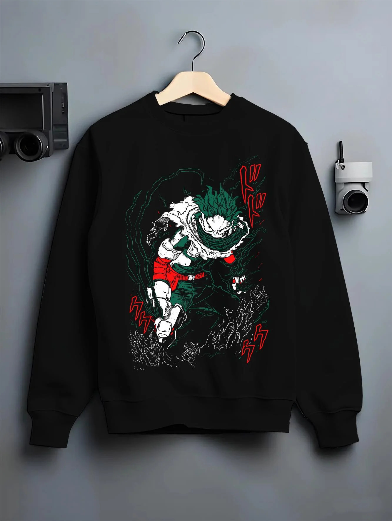Black crewneck sweatshirt on hanger with My Hero Academia Hoodie Izuku Midoriya Plus Ultra graphic bold anime graphic.