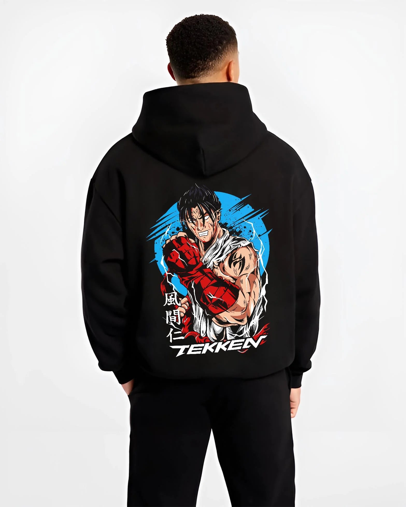 Black hoodie worn by male model, back view with Tekken Hoodie Jin Kazama Iron Fist Champion Jumper graphic streetwear graphic.