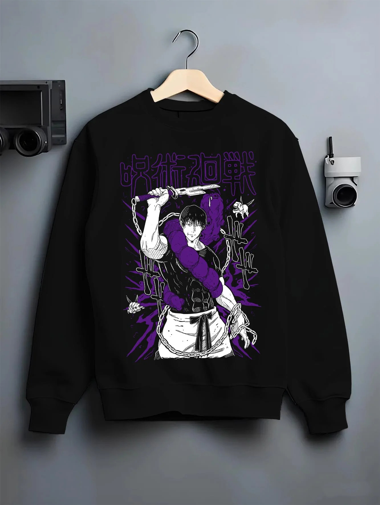Black crewneck sweatshirt on hanger with Jujutsu Kaisen Hoodie Cursed Spirit Fighter Jumper graphic Toji themed artwork.