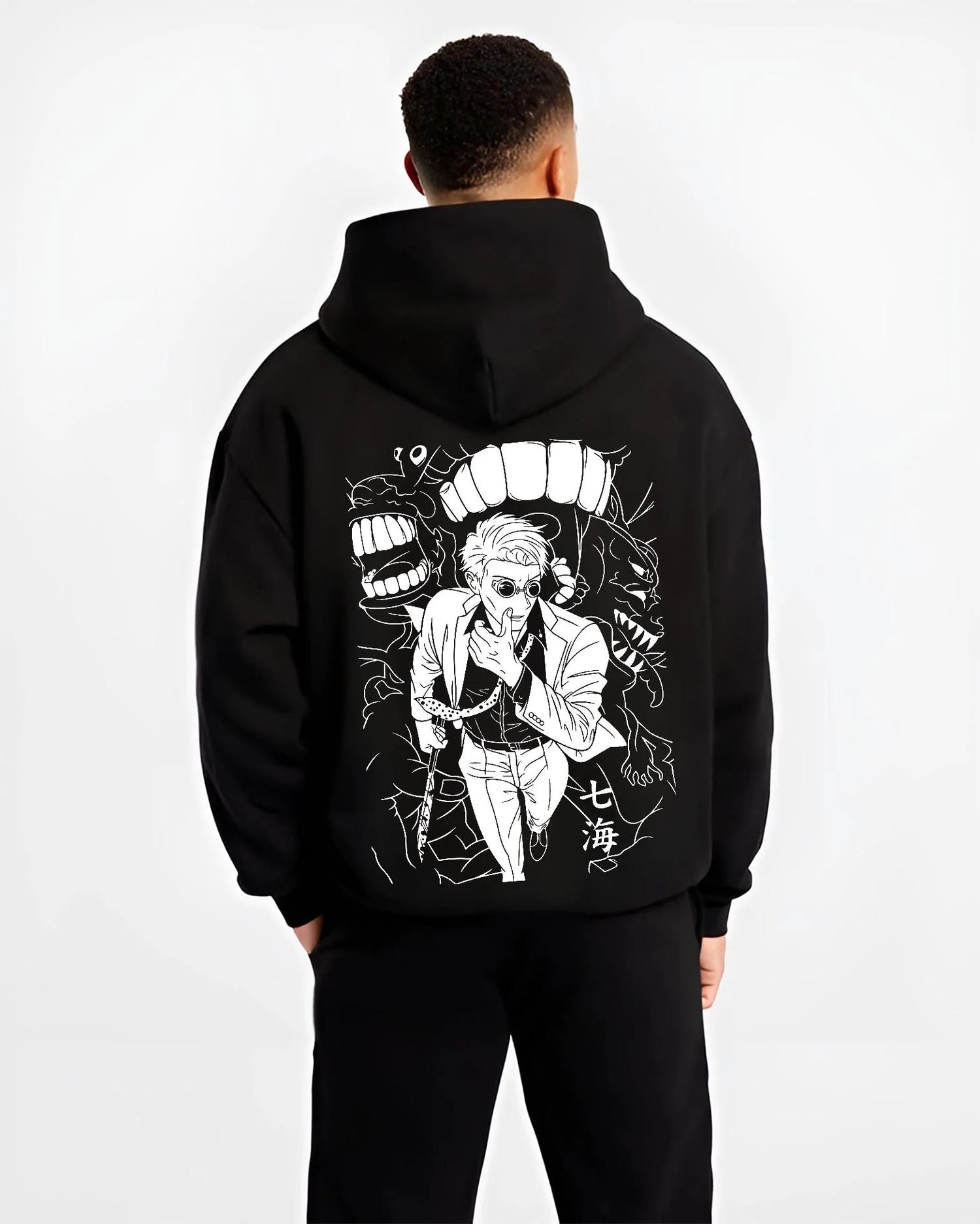 Black hoodie worn by male model, back view with Jujutsu Kaisen Hoodie Satoru Gojo Dark Energy Jumper graphic streetwear graphic.
