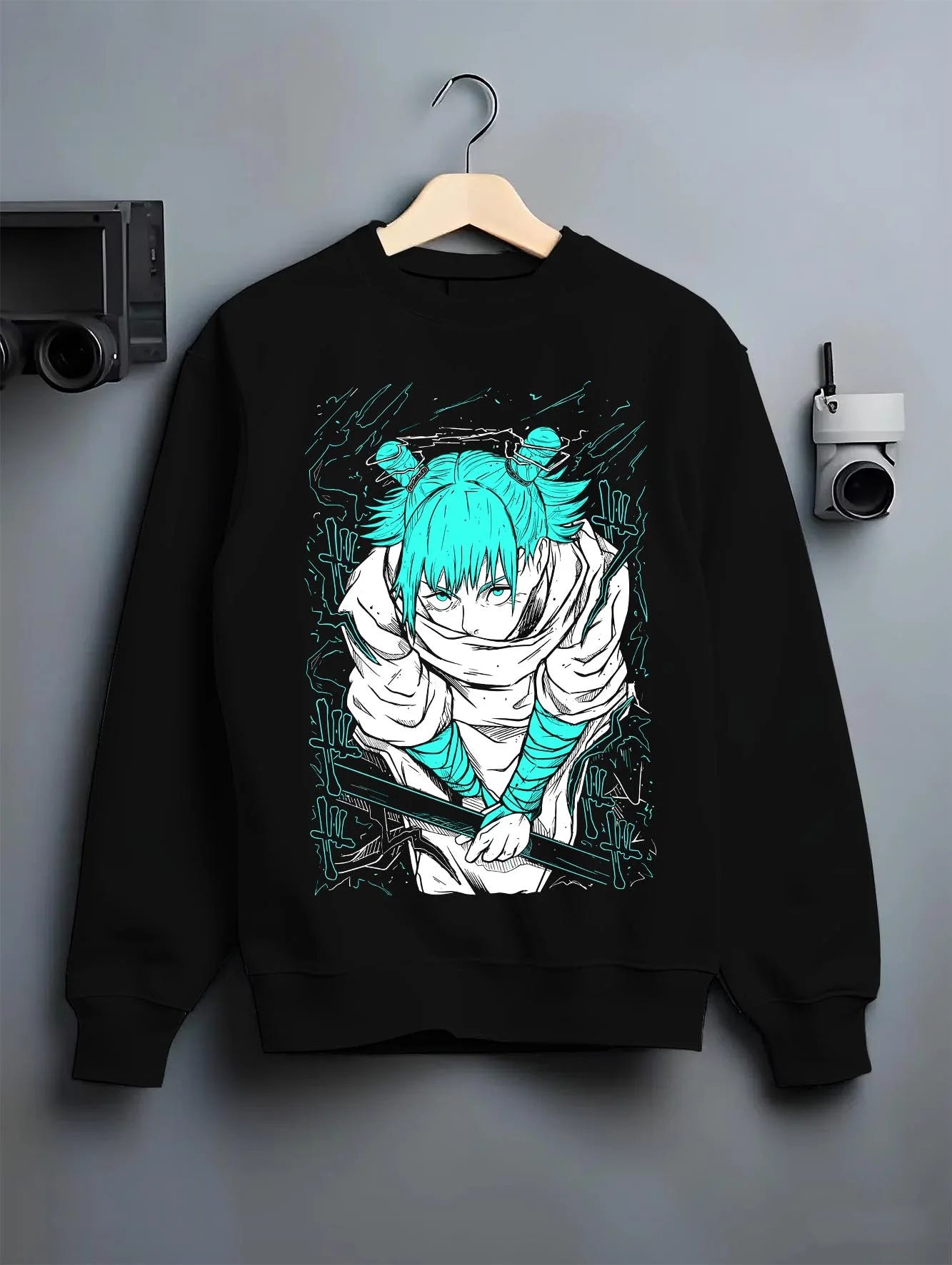 Black crewneck sweatshirt on hanger with Jujutsu Kaisen Hoodie Yuji Itadori Cursed Energy Jumper graphic bold anime graphic.