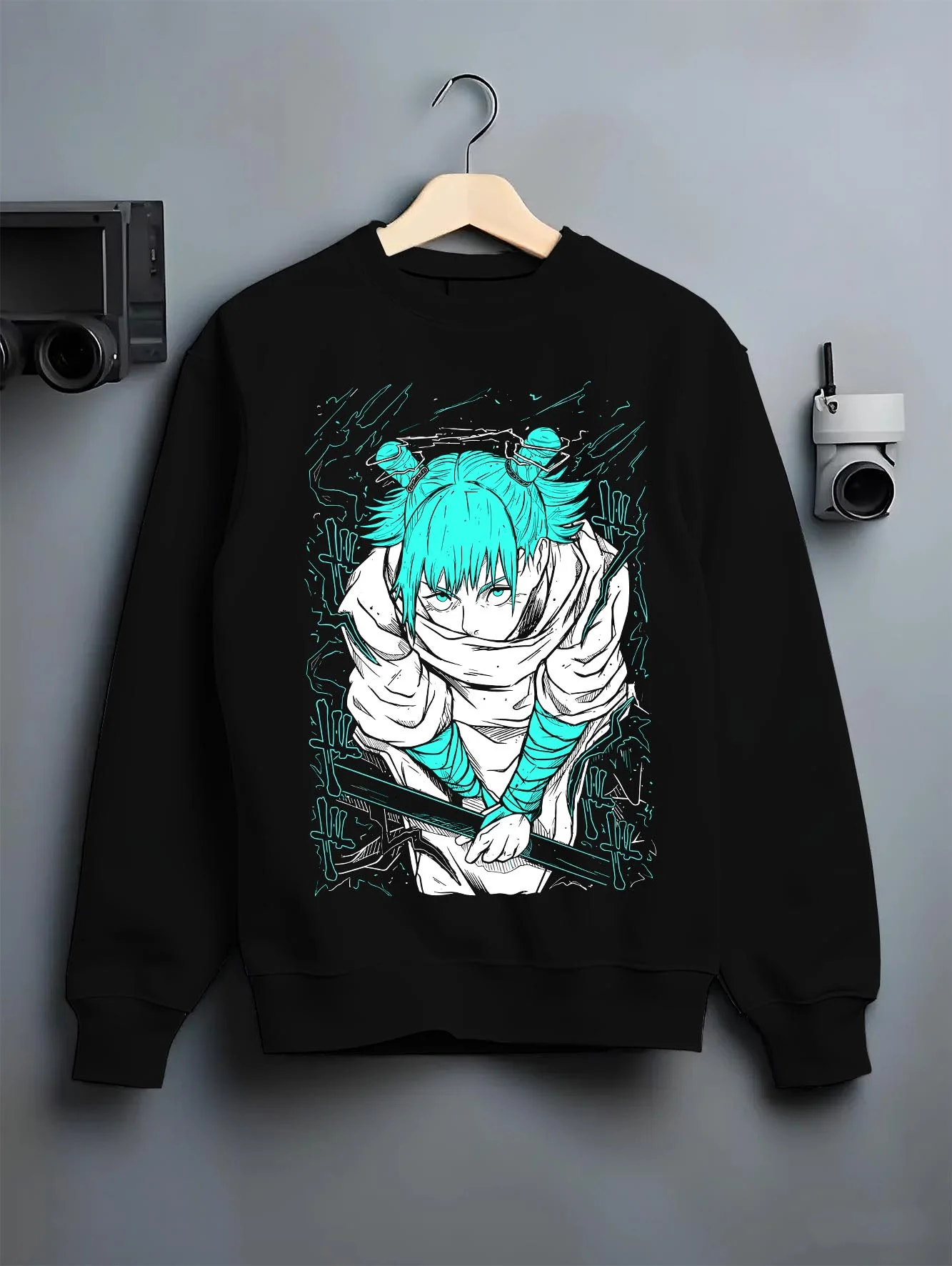 Black crewneck sweatshirt on hanger with Jujutsu Kaisen Hoodie Yuji Itadori Cursed Energy Jumper graphic bold anime graphic.