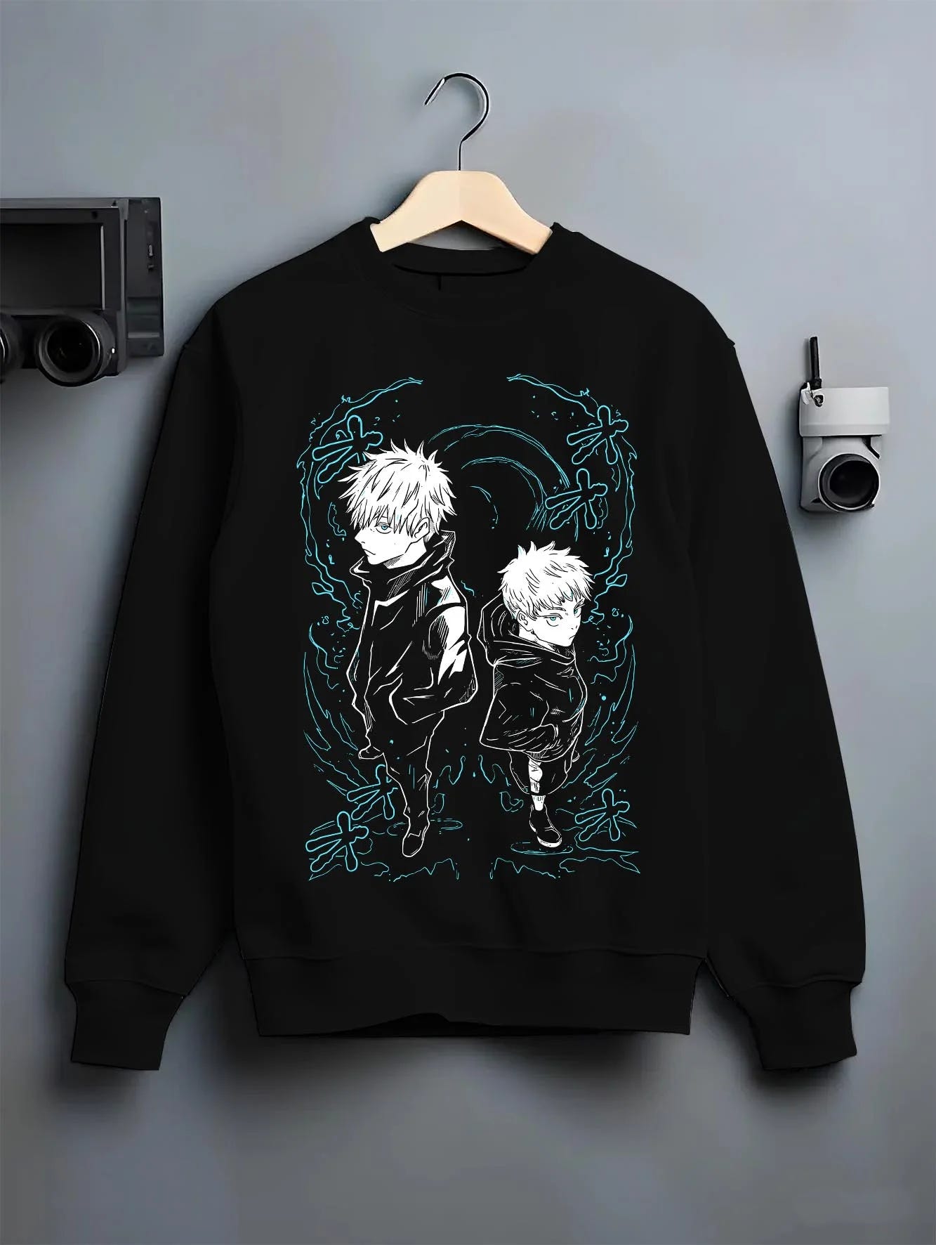 Black crewneck sweatshirt on hanger with Jujutsu Kaisen Hoodie Yuji and Megumi Logo Jumper graphic premium wear.