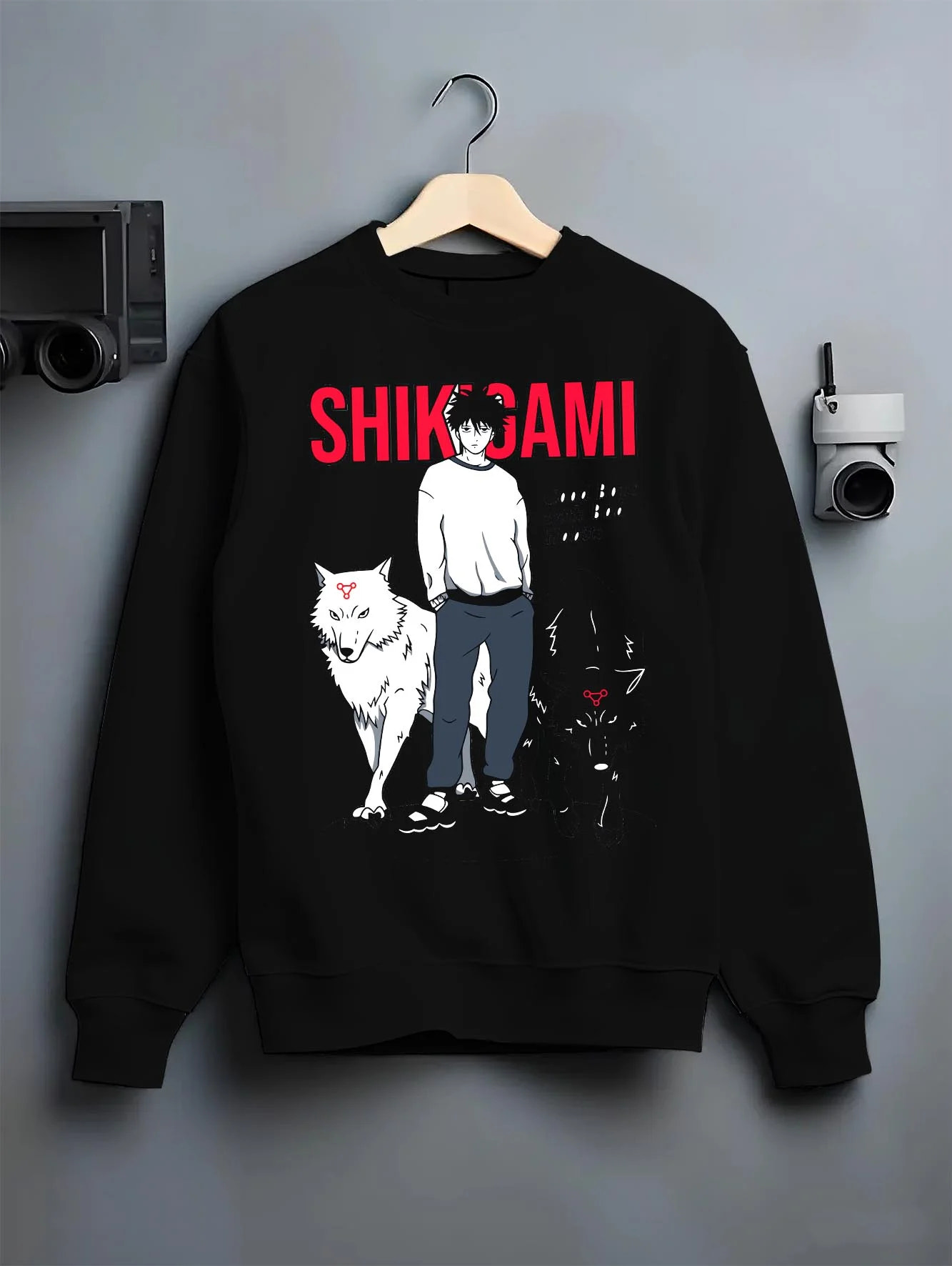 Black crewneck sweatshirt on hanger with Jujutsu Kaisen Hoodie Shikigami User Summon Jumper graphic premium wear.