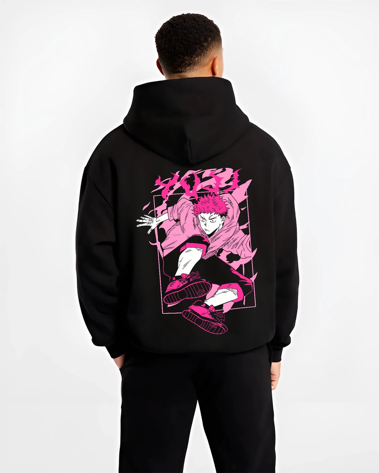 Black hoodie worn by male model, back view with Jujutsu Kaisen Hoodie Yuji Itadori Dynamic Jump Jumper graphic streetwear graphic.