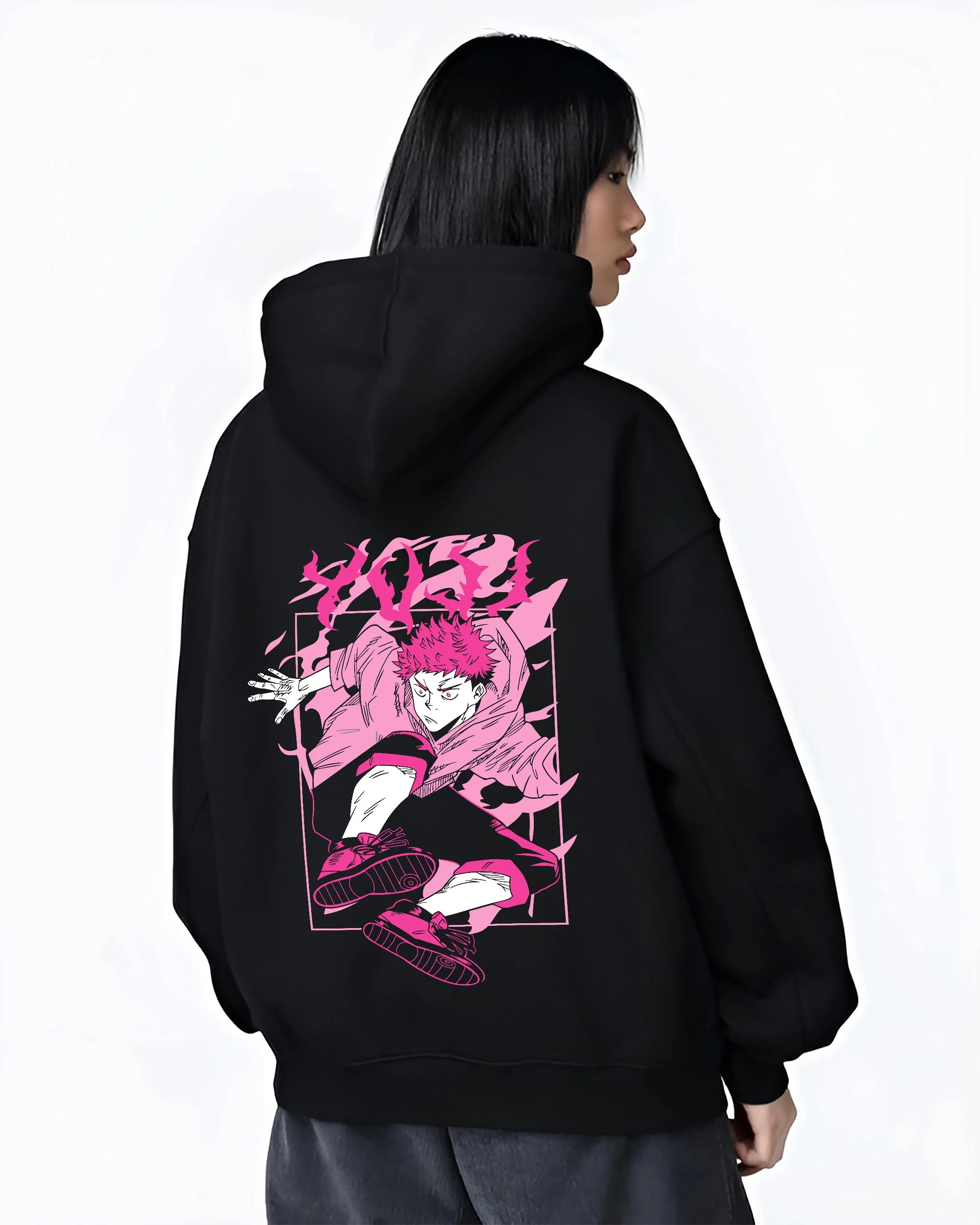 Black hoodie worn by female model, back view with Jujutsu Kaisen Hoodie Yuji Itadori Dynamic Jump Jumper graphic bold anime graphic.