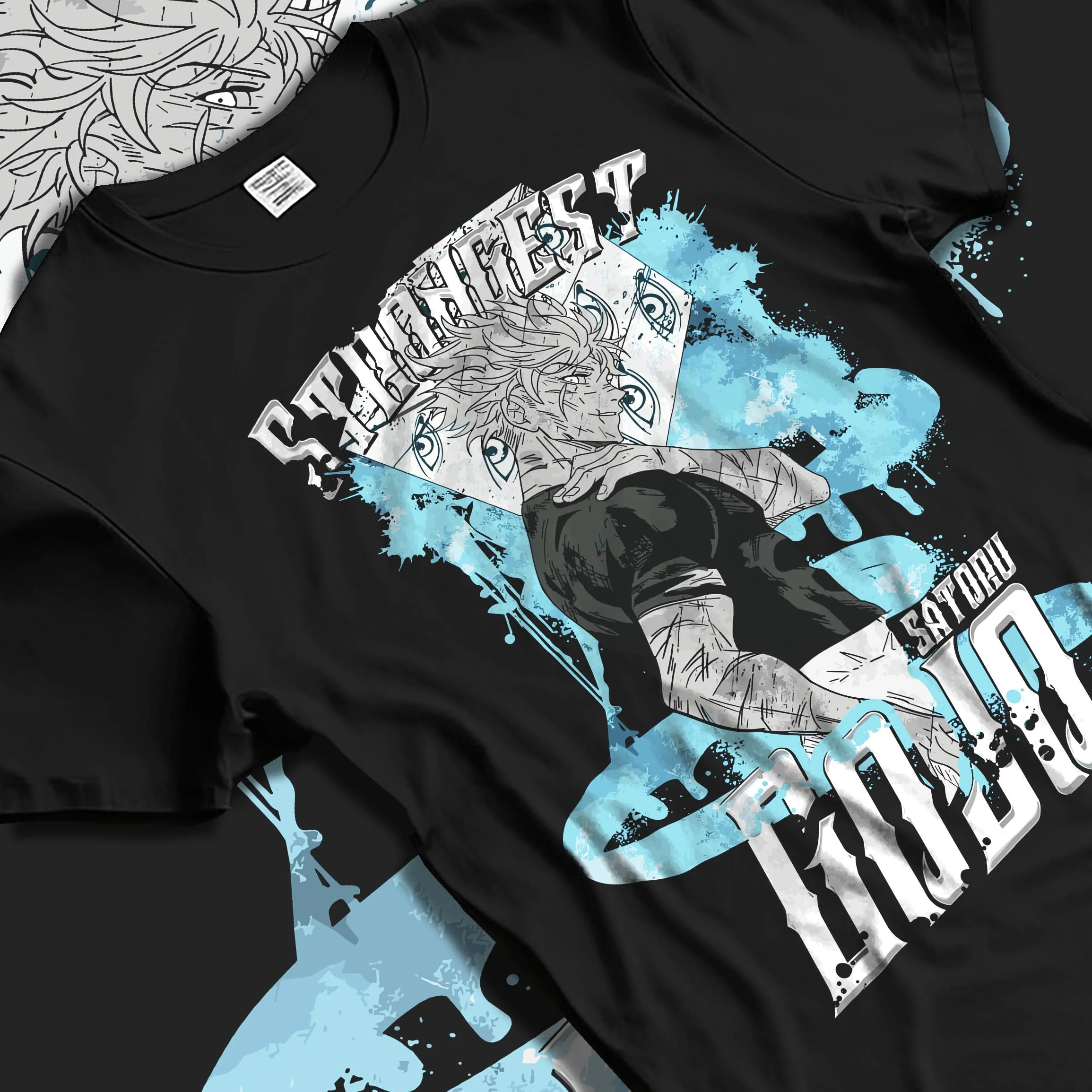 Black T-shirt laid flat with natural folds with Jujutsu Kaisen Hoodie Satoru Gojo Strongest Sorcerer graphic premium wear.