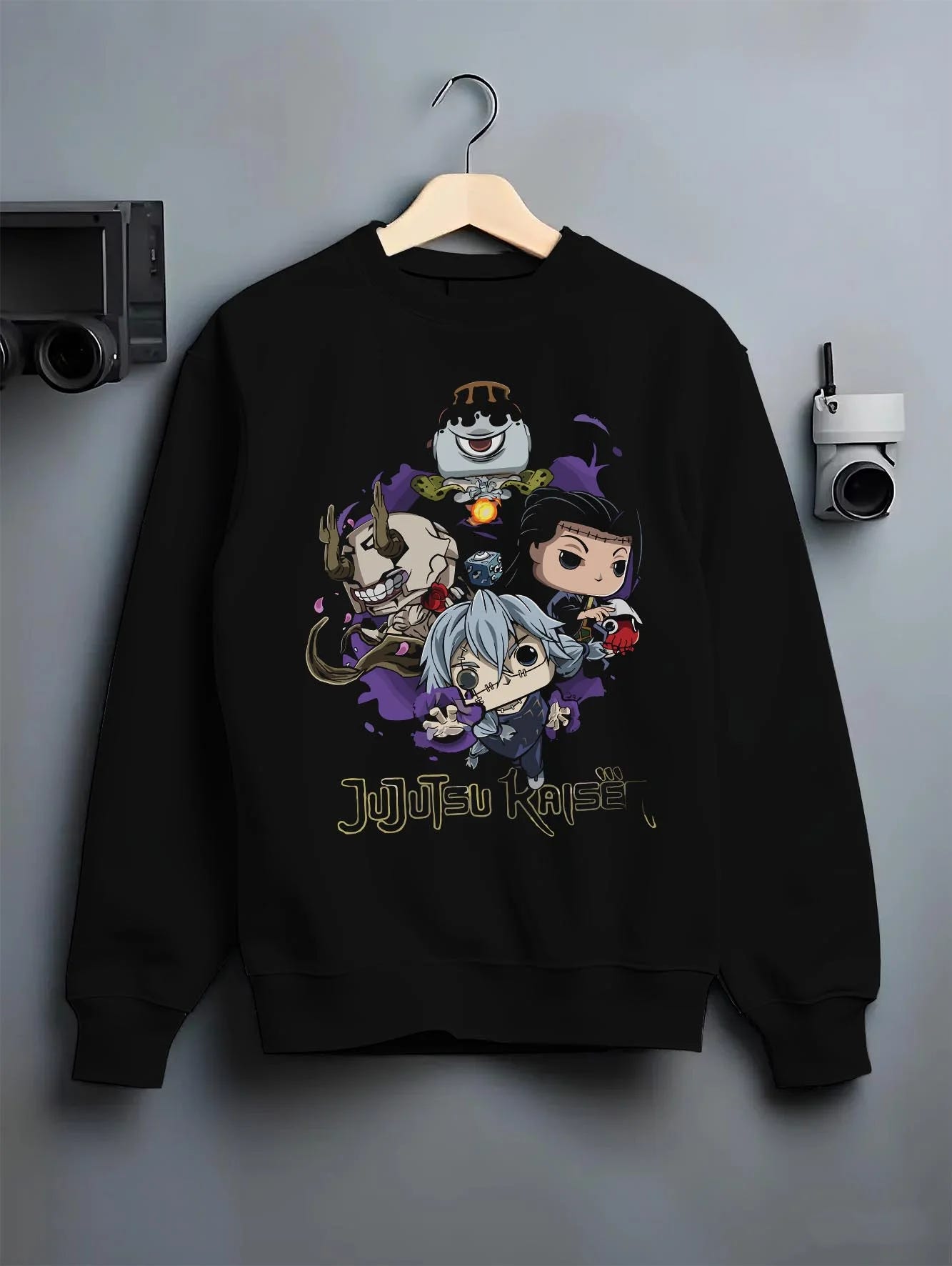 Black crewneck sweatshirt on hanger with Jujutsu Kaisen Hoodie Pop Figure Set Gojo and Yuji graphic bold anime graphic.