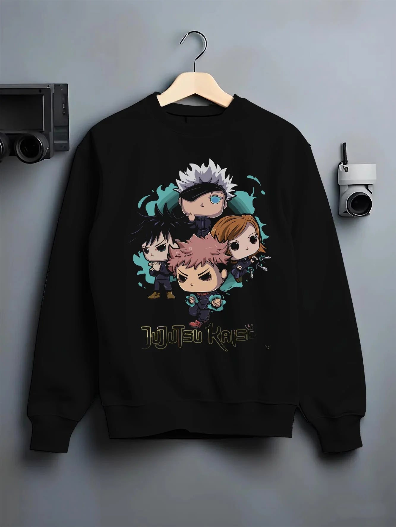Black crewneck sweatshirt on hanger with Jujutsu Kaisen Hoodie Pop Figure Set Sukuna and Megumi graphic streetwear graphic.