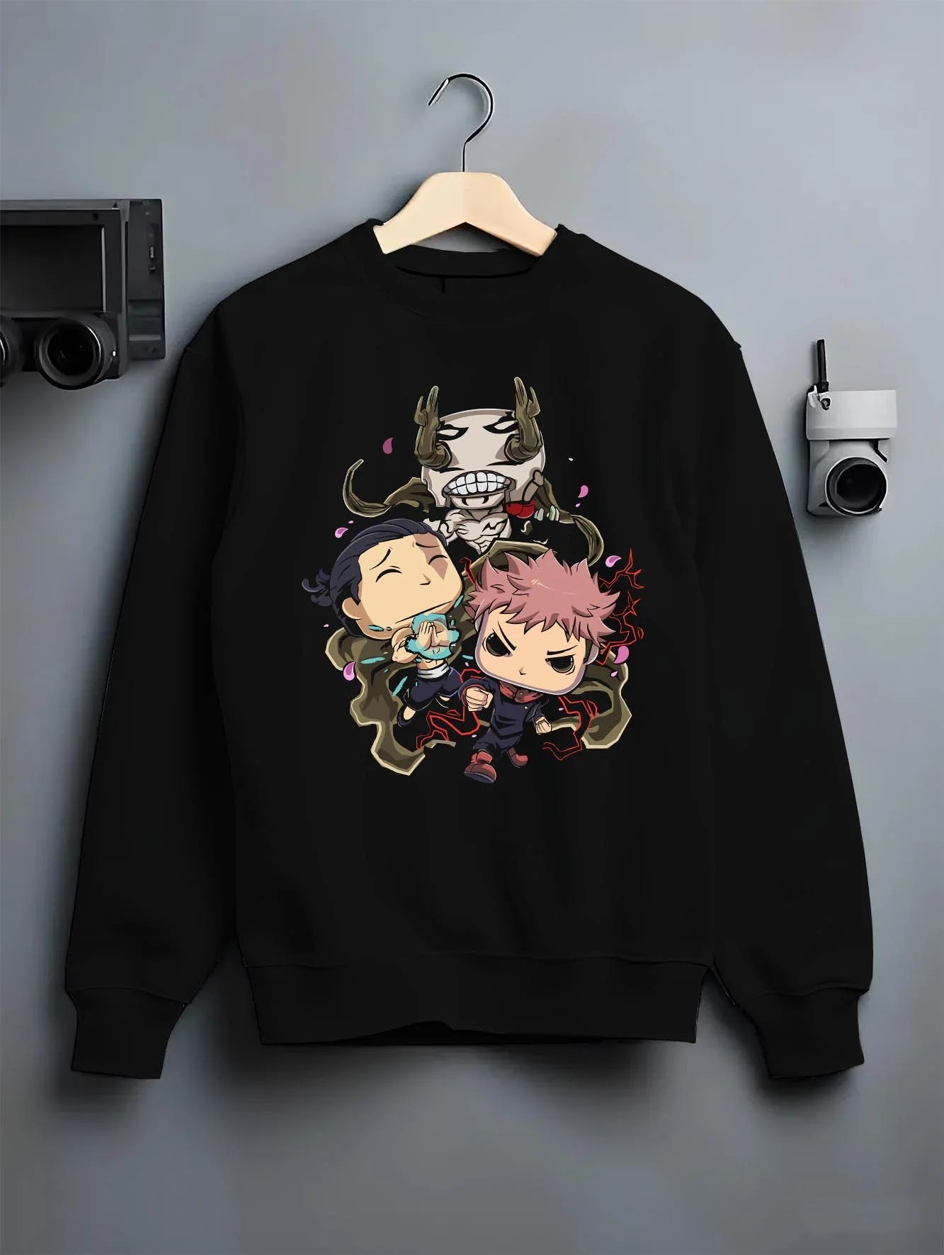 Black crewneck sweatshirt on hanger with Jujutsu Kaisen Hoodie Pop Figure Set Choso and Yuji graphic bold anime graphic.
