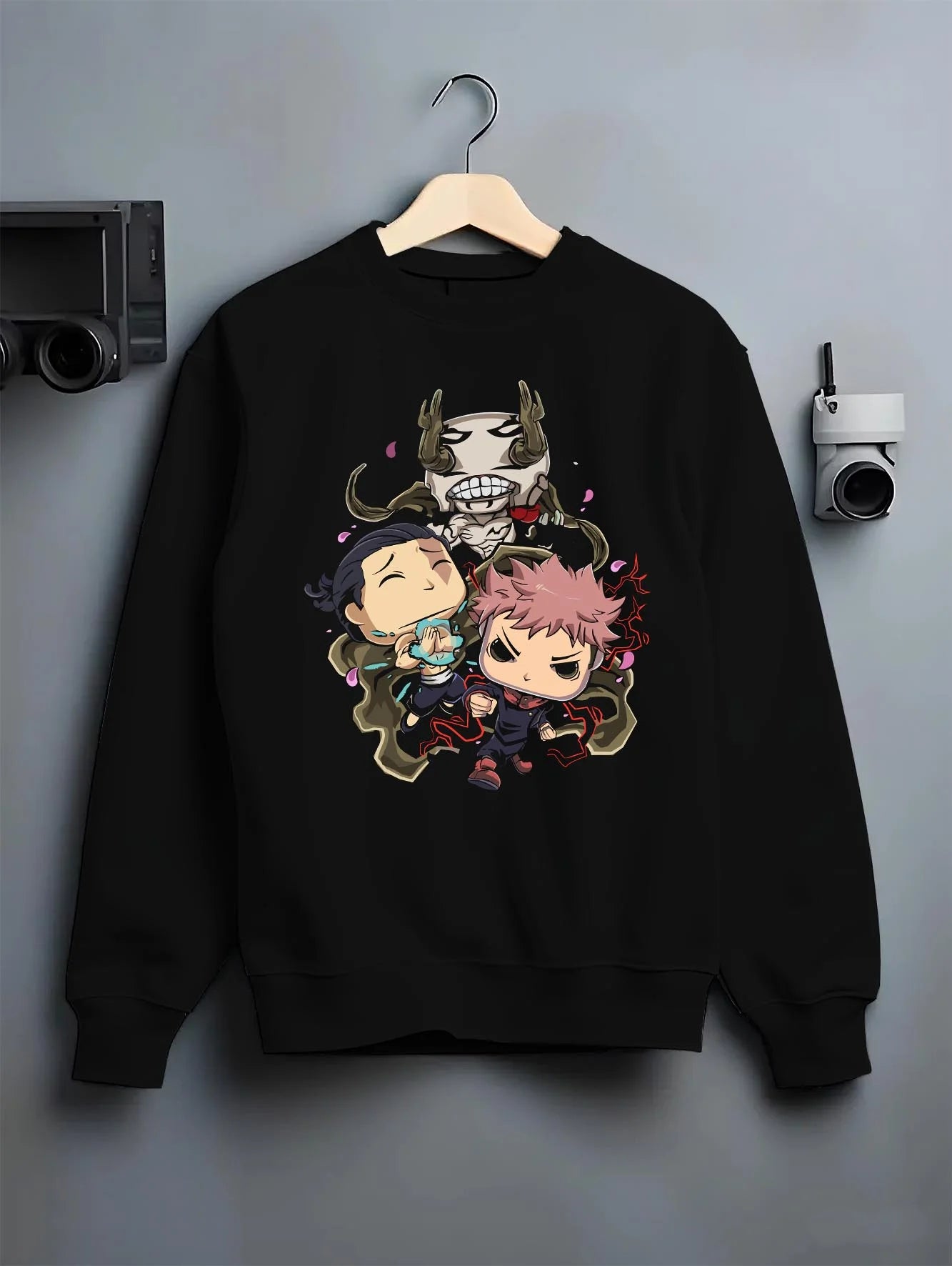 Black crewneck sweatshirt on hanger with Jujutsu Kaisen Hoodie Pop Figure Set Choso and Yuji graphic bold anime graphic.