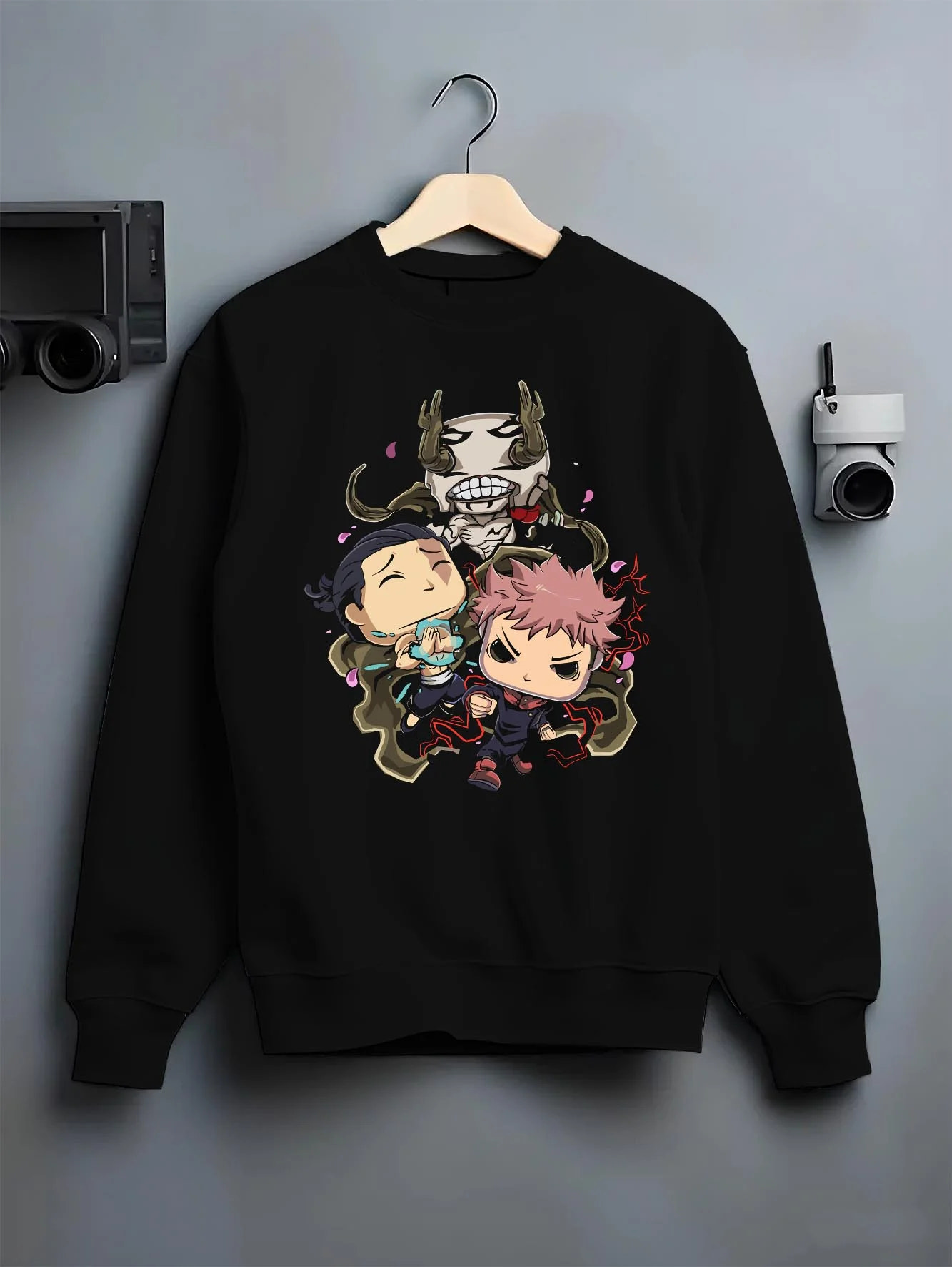 Black crewneck sweatshirt on hanger with Jujutsu Kaisen Hoodie Pop Figure Set Choso and Yuji graphic bold anime graphic.