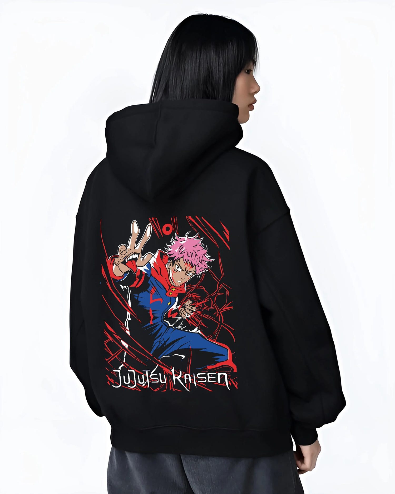 Black hoodie worn by female model, back view with Jujutsu Kaisen Hoodie Yuji Itadori Hero Punch Jumper graphic streetwear graphic.