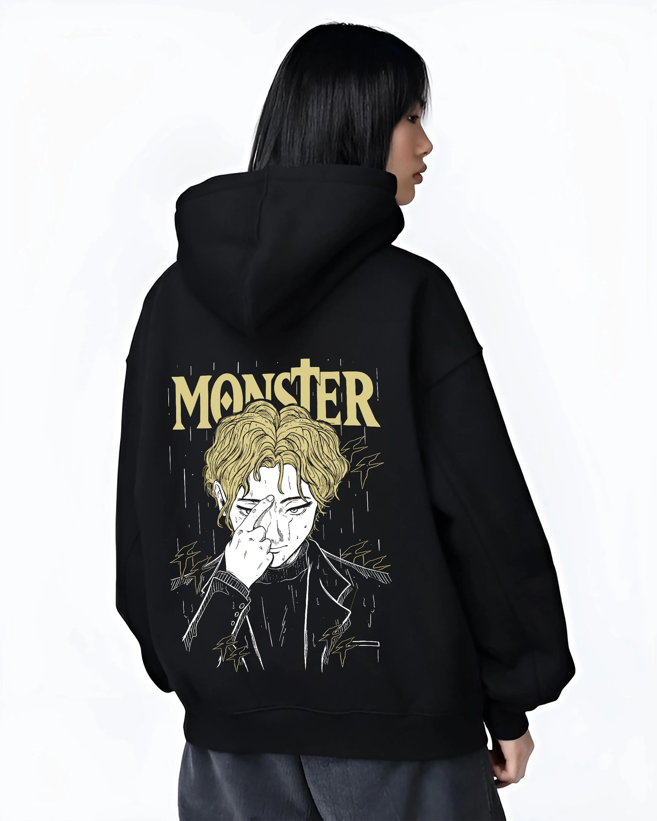 Black hoodie worn by female model, back view with Monster Hoodie Johan Liebert Psychological Thriller graphic bold anime graphic.
