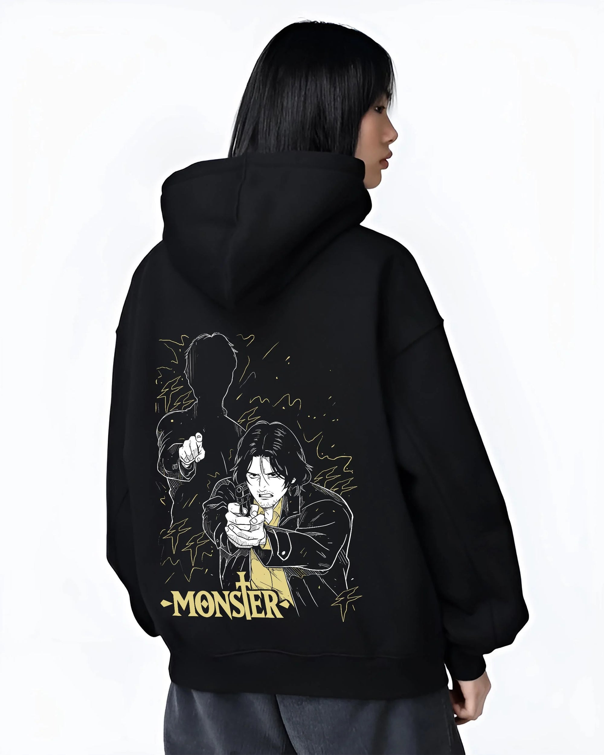 Black hoodie worn by female model, back view with Monster Hoodie Johan Dark Mystery Thriller Jumper graphic bold anime graphic.