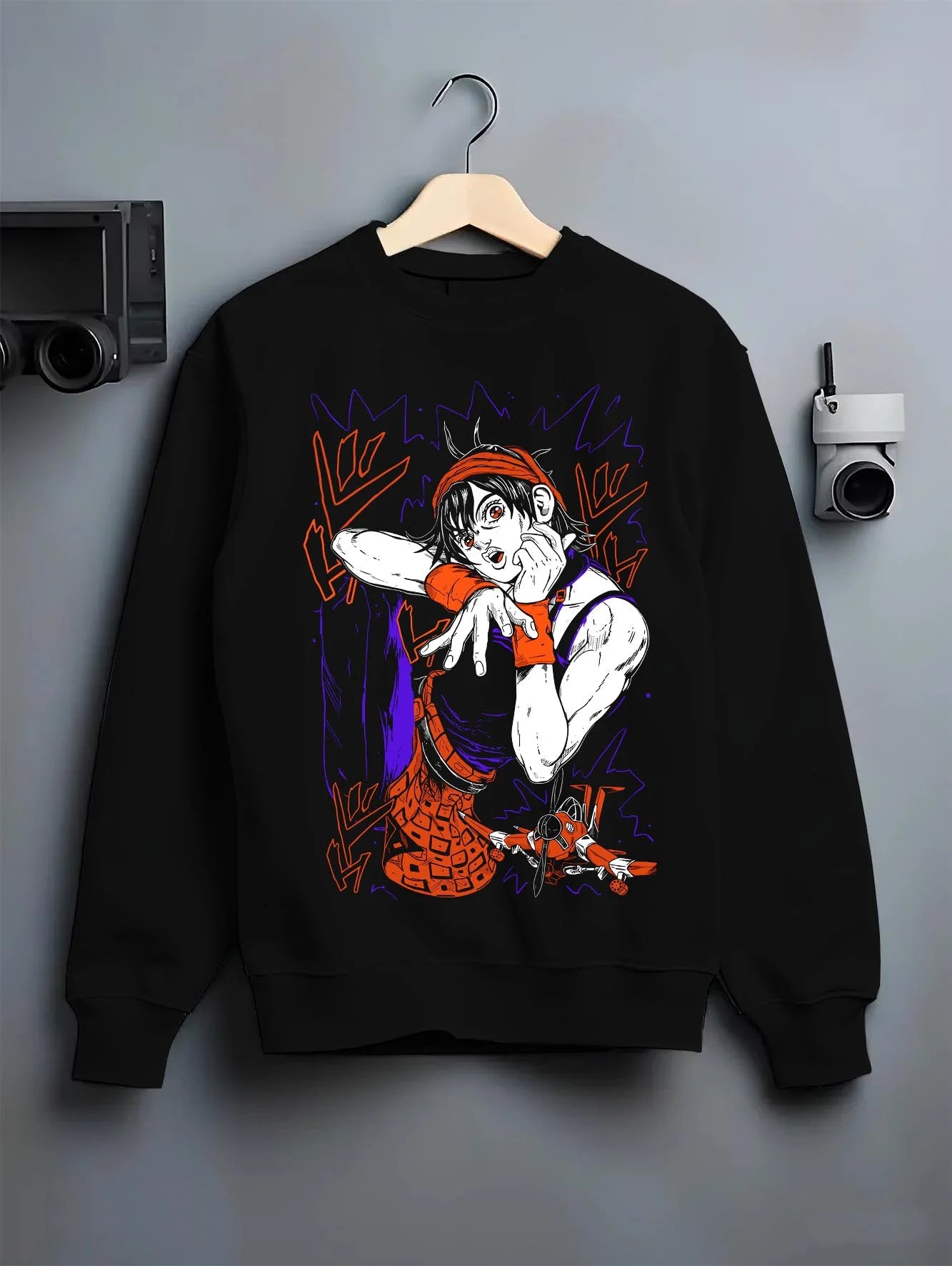 Black crewneck sweatshirt on hanger with Guido Mista Hoodie JoJo’s Bizarre Adventure Stand Bullet graphic bold anime graphic.