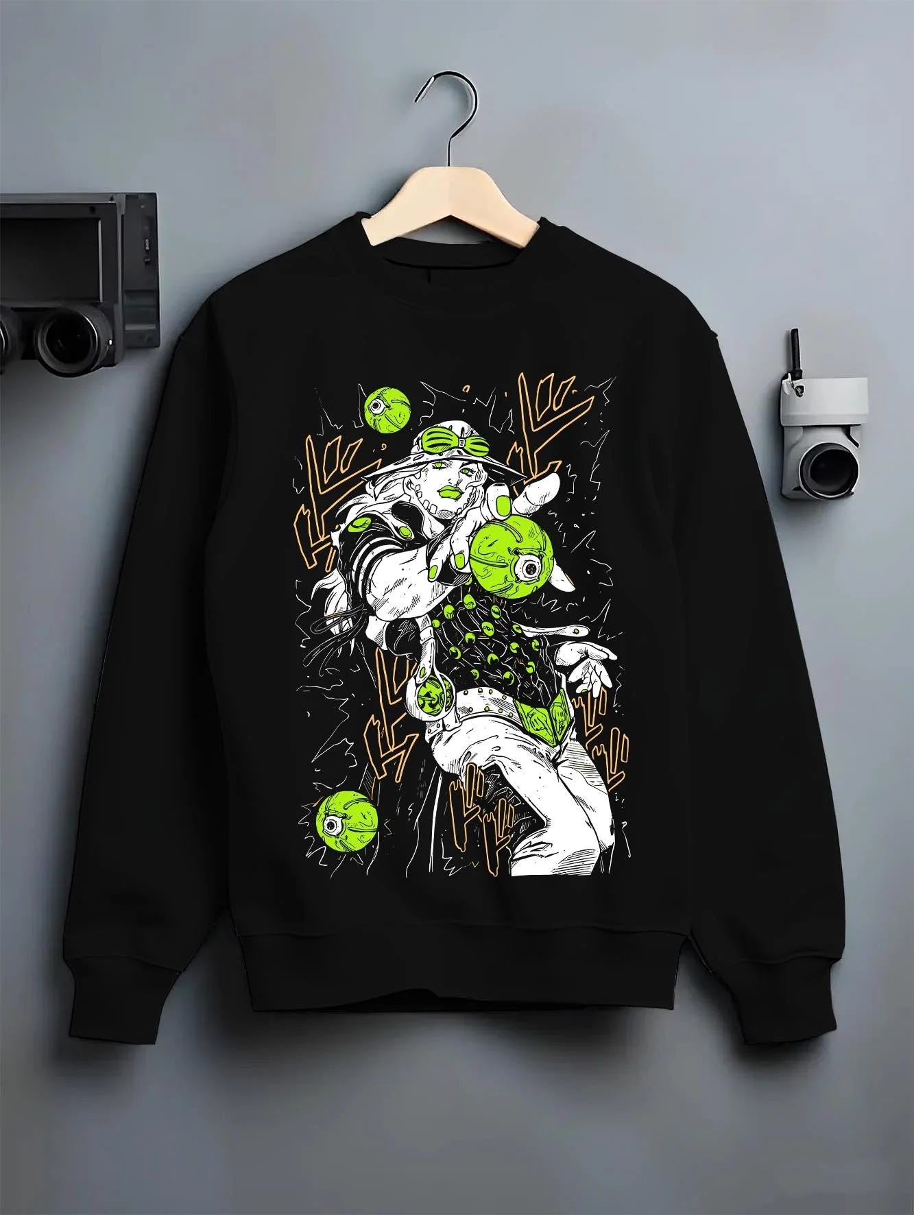 Black crewneck sweatshirt on hanger with Jolyne Cujoh Hoodie JoJo’s Bizarre Adventure Stone Ocean graphic premium wear.