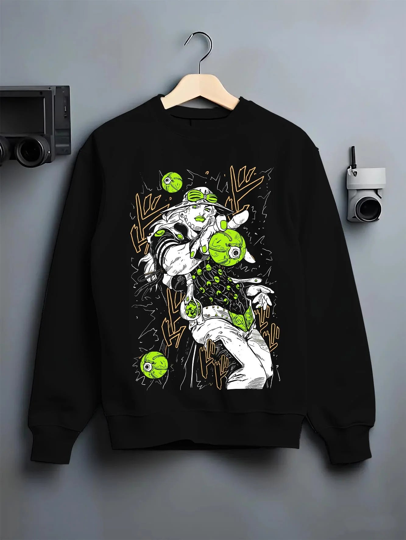 Black crewneck sweatshirt on hanger with Jolyne Cujoh Hoodie JoJo’s Bizarre Adventure Stone Ocean graphic premium wear.