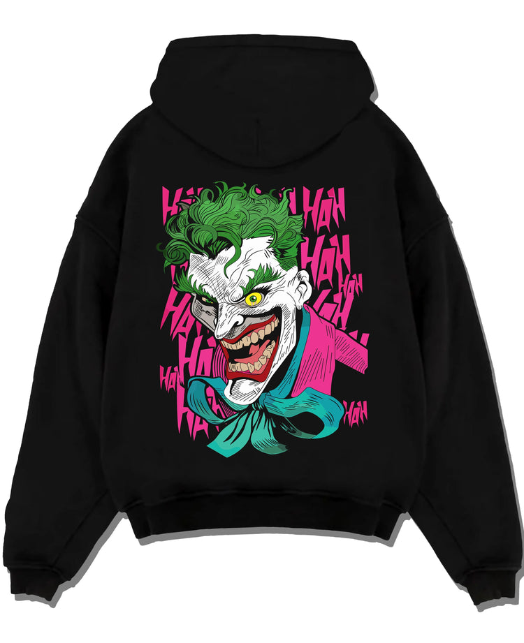 Black pullover hoodie laid flat with Joker Hoodie Gotham Anime Inspired Laughing Villain Design graphic premium wear.