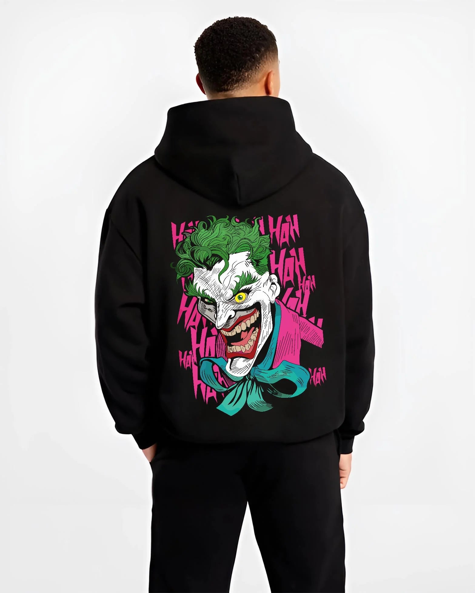 Black hoodie worn by male model, back view with Joker Hoodie Gotham Anime Inspired Laughing Villain Design graphic premium wear.