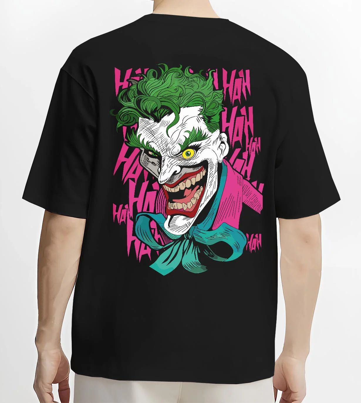 Black T-shirt worn by male model, back view with Joker Hoodie Gotham Anime Inspired Laughing Villain Design graphic streetwear graphic.