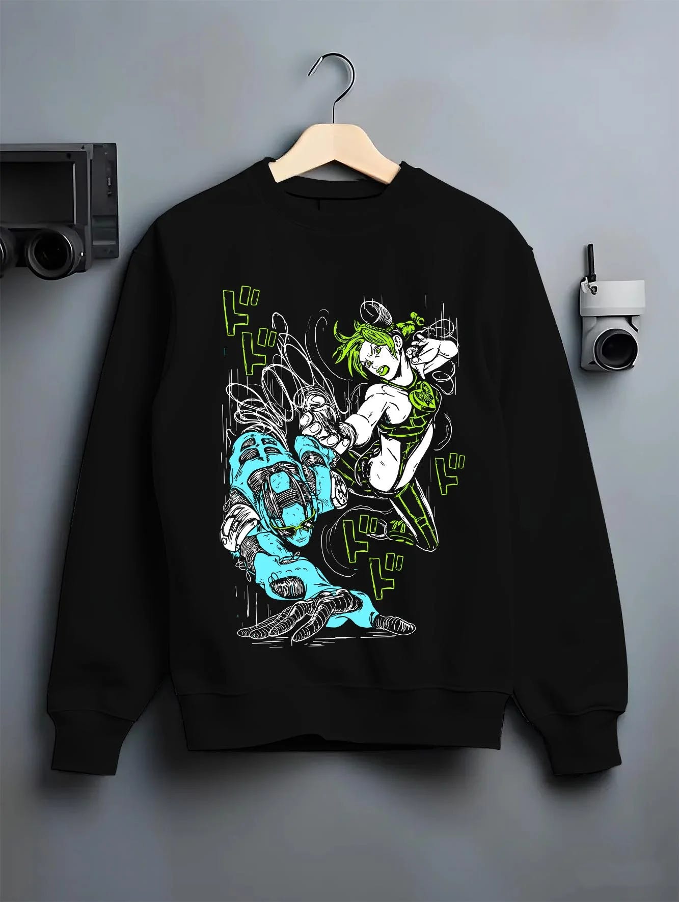 Black crewneck sweatshirt on hanger with Jolyne Cujoh Hoodie JoJo’s Bizarre Adventure Anime Pose graphic streetwear graphic.