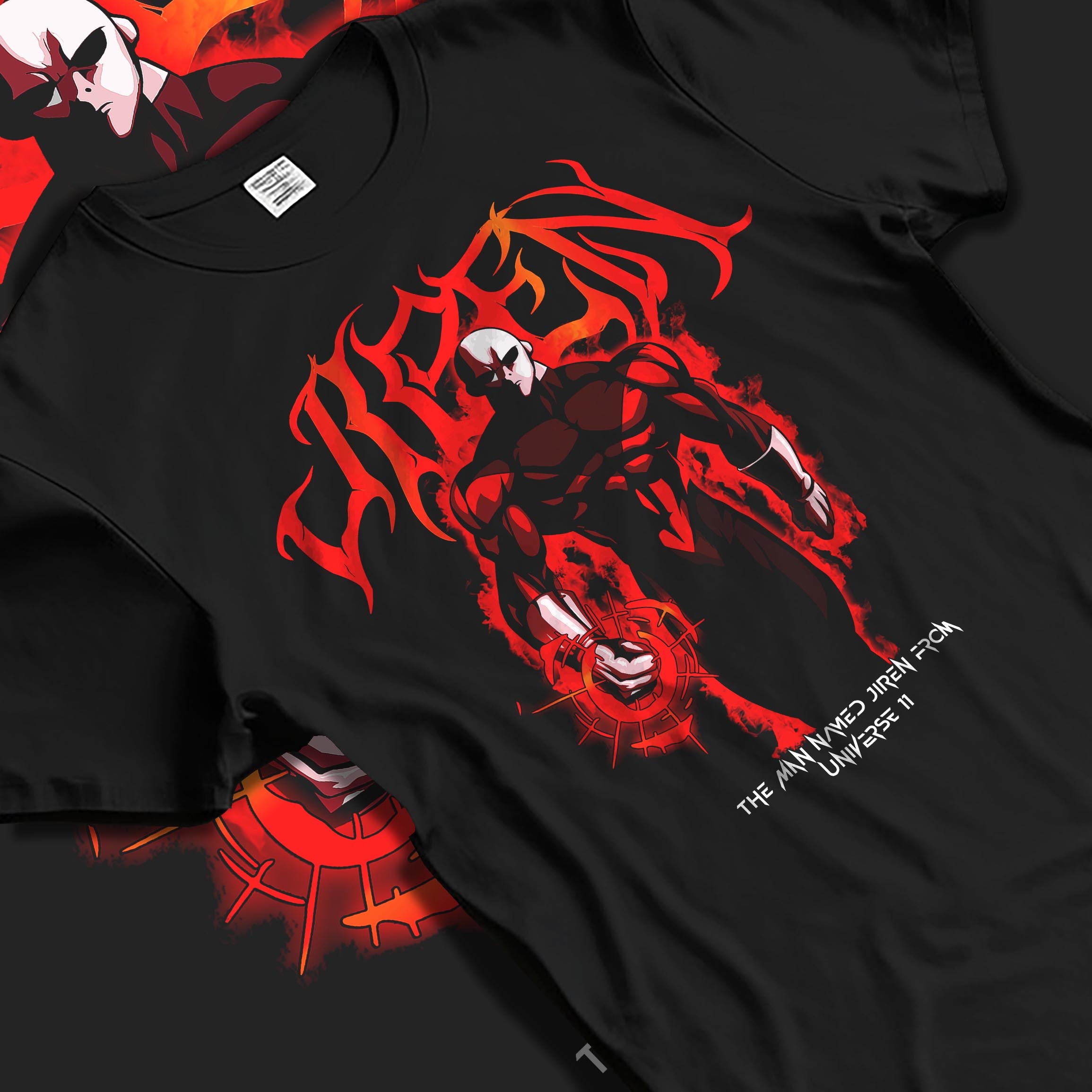 Black T-shirt laid flat with natural fabric folds, featuring Dragon Ball Super Jiren anime poster inspired artwork with glowing aura and shonen battle pose.