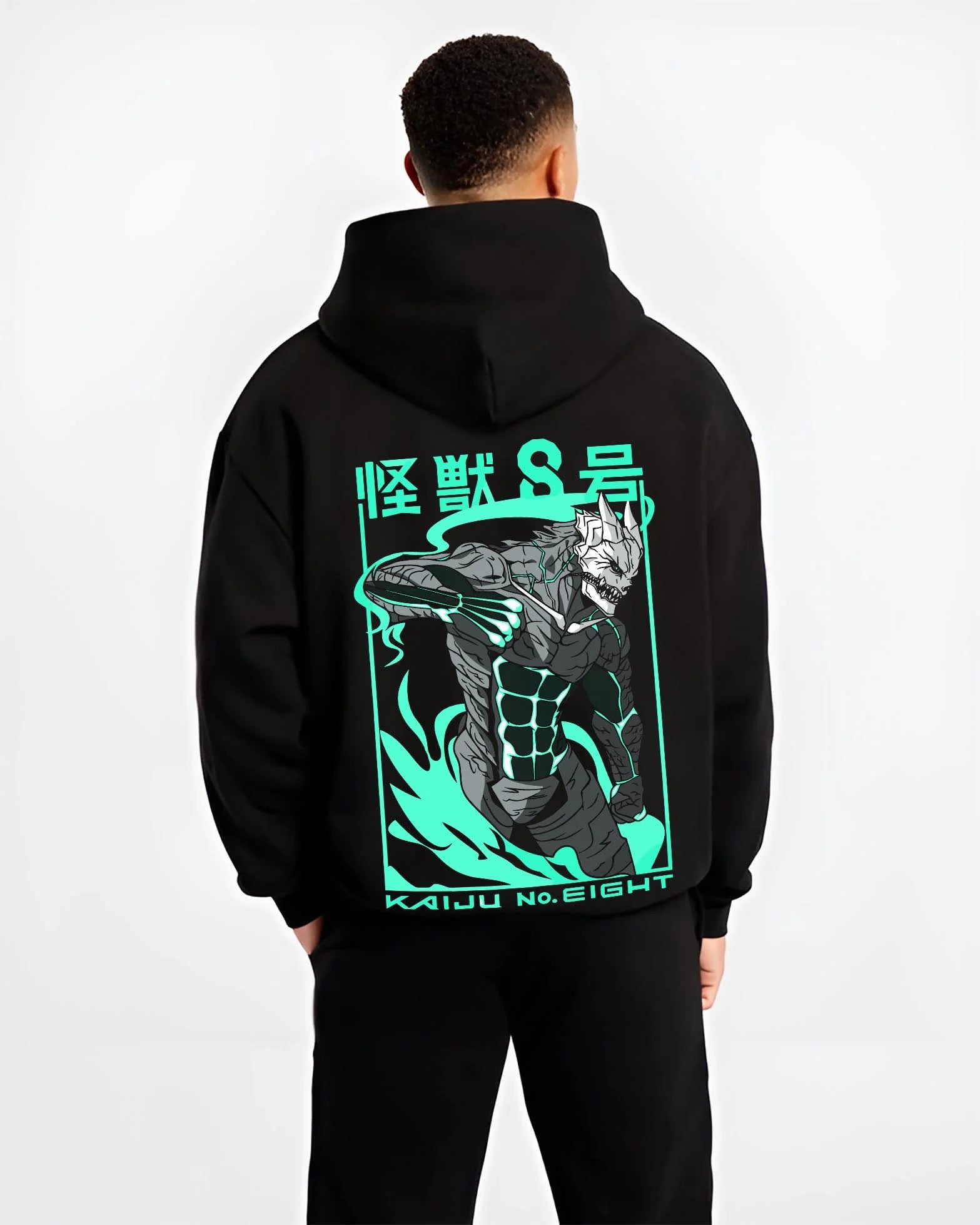 Black hoodie worn by male model, back view with Kaiju No. 8 Hoodie Anime Kaiju Monster Fight Design graphic streetwear graphic.