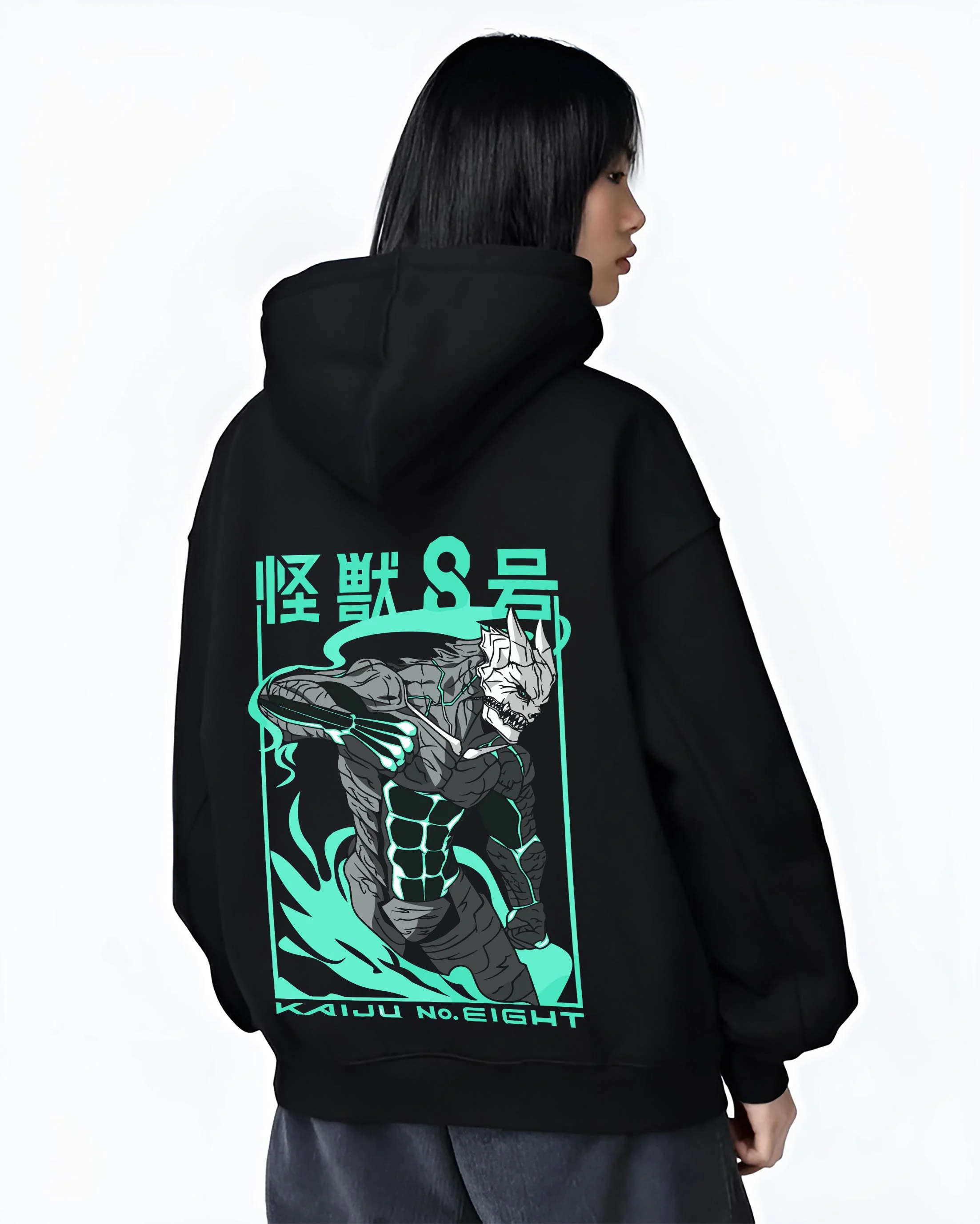 Black hoodie worn by female model, back view with Kaiju No. 8 Hoodie Anime Kaiju Monster Fight Design graphic streetwear graphic.