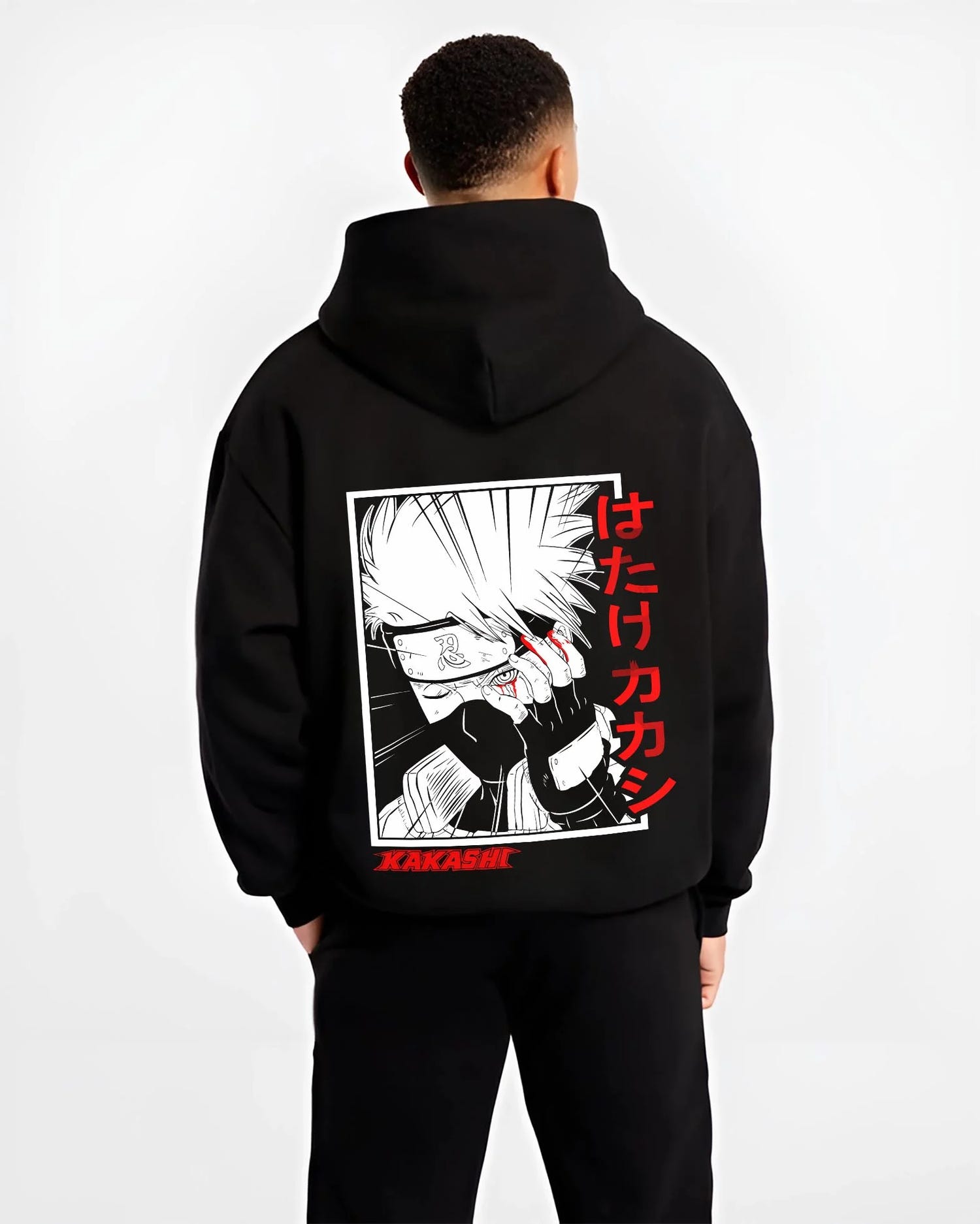Black hoodie worn by male model, back view with Kakashi Hatake Hoodie Naruto Copy Ninja Hidden Leaf graphic premium wear.