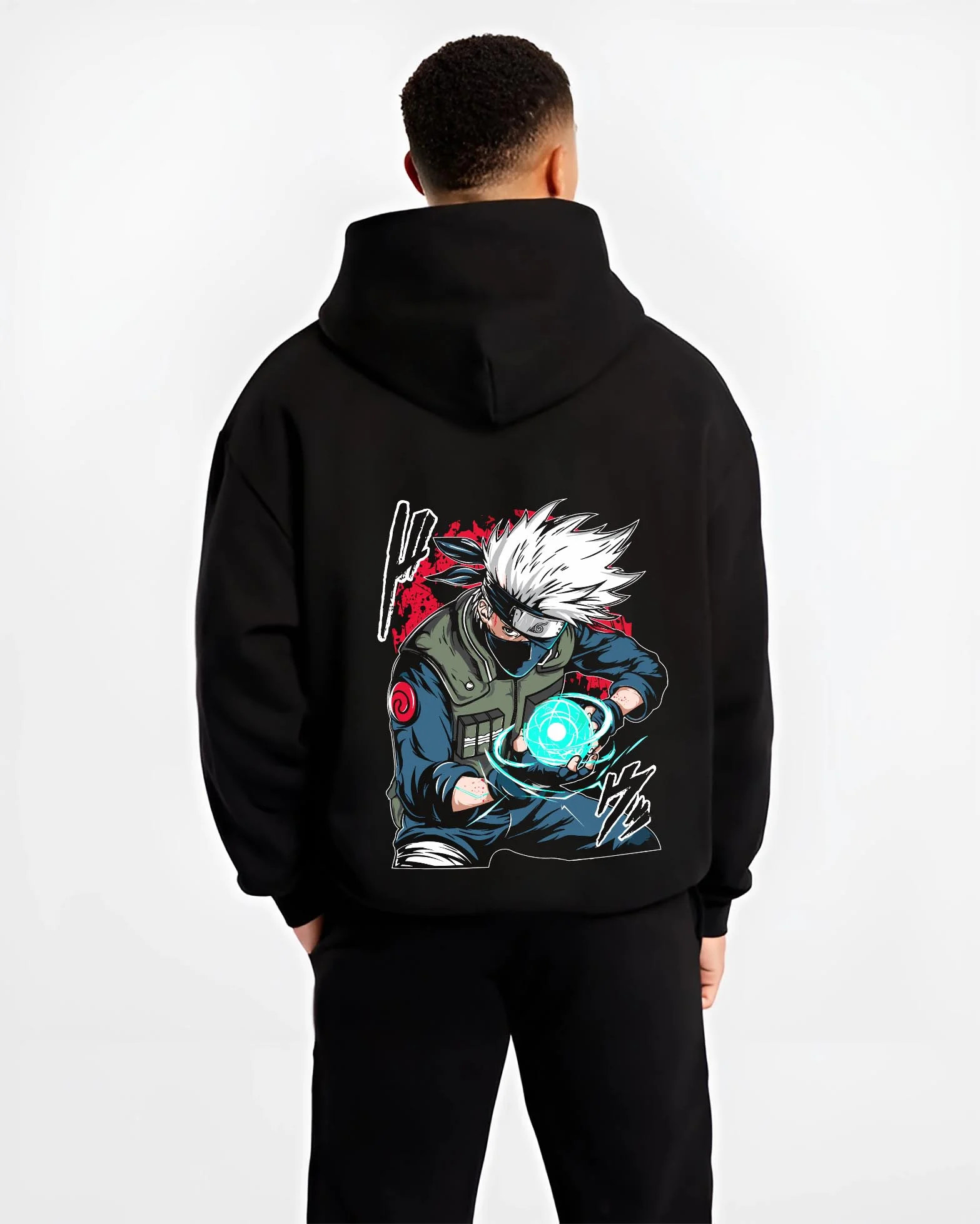 Black hoodie worn by male model, back view with Kakashi Hatake Hoodie Naruto Rasengan Jonin Pose graphic streetwear graphic.