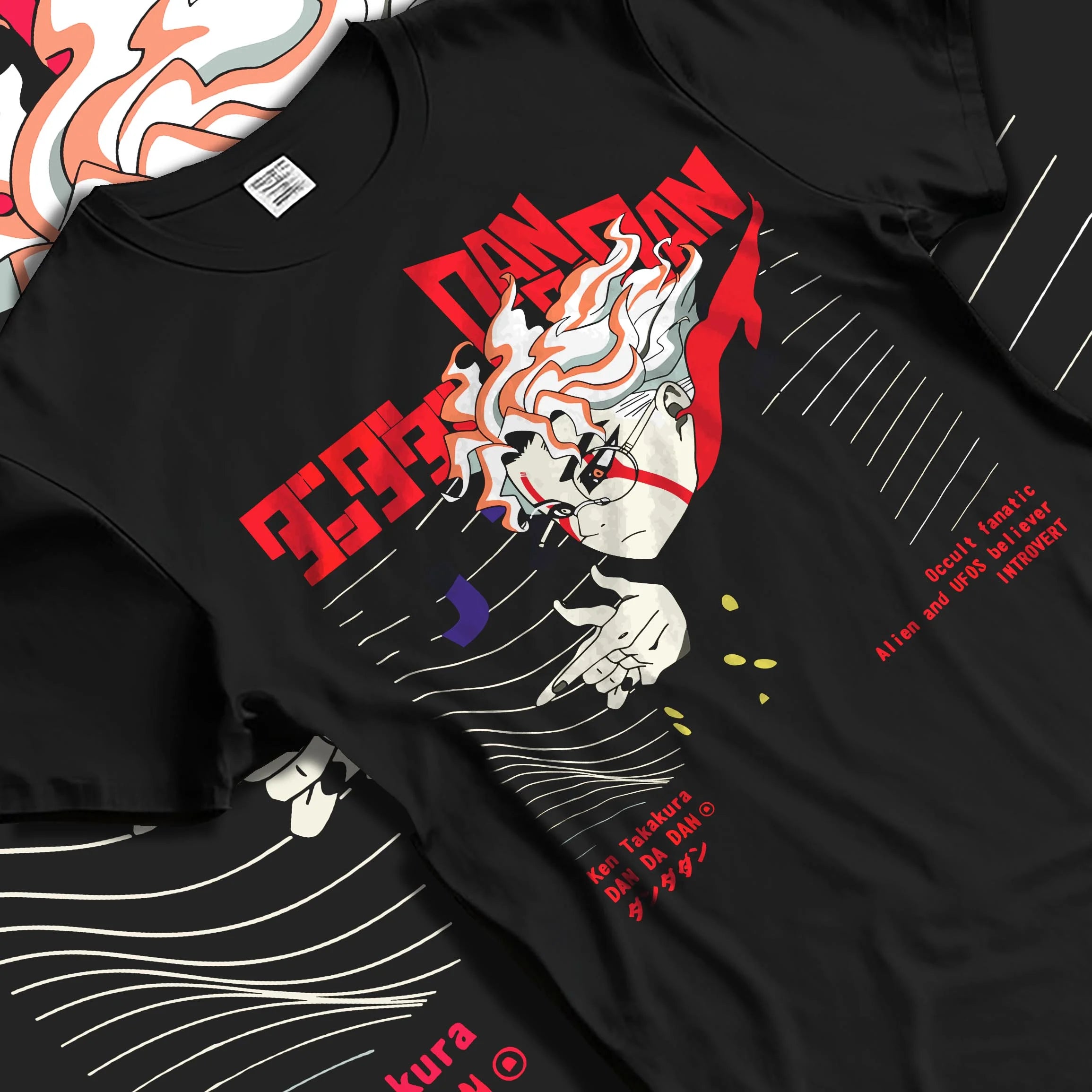 Black T-shirt laid flat with natural folds with Ken Takakura Dandadan Hoodie Occult UFO Believer Retro graphic premium wear.