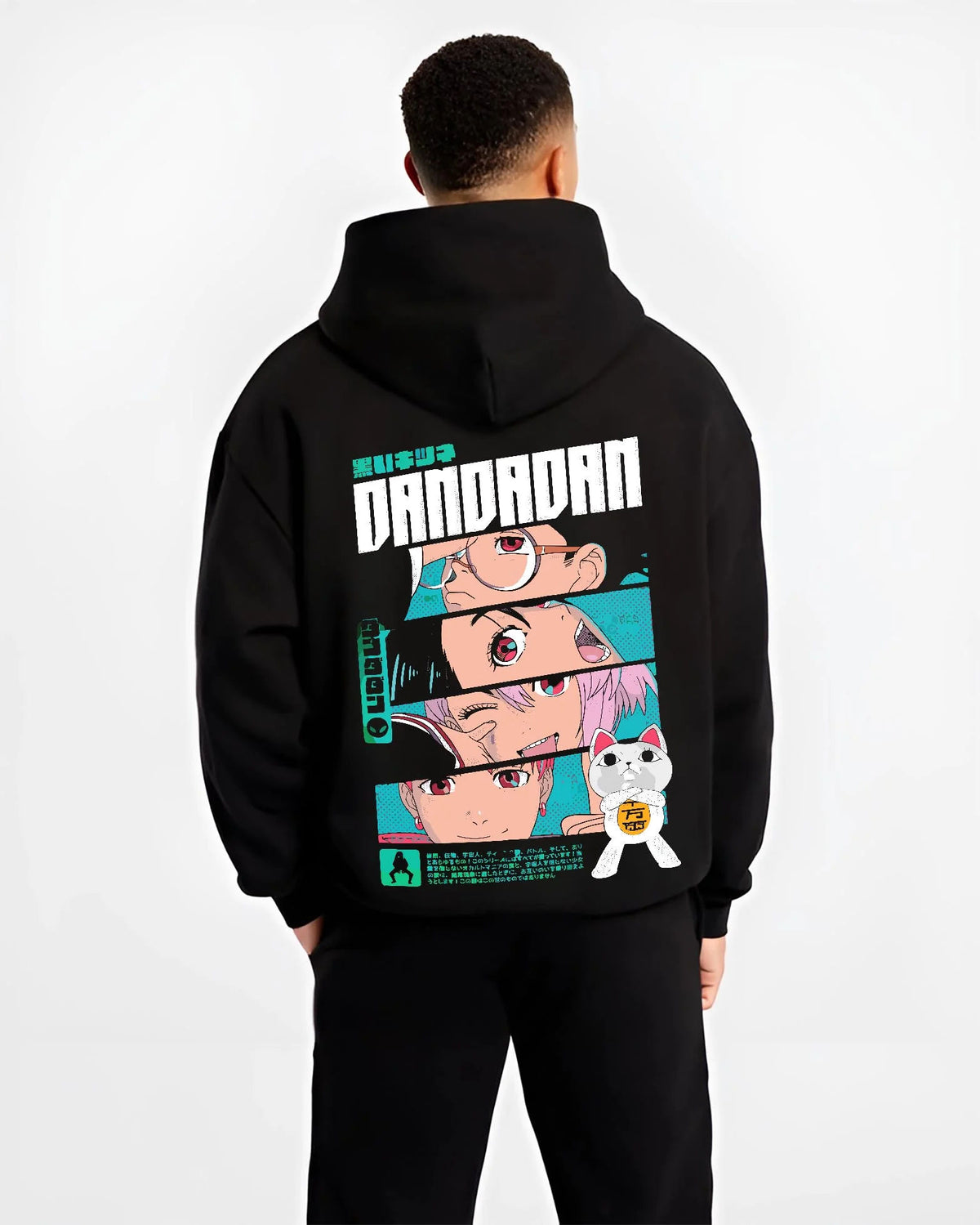 Black hoodie model back view showing Dandadan ensemble: Okarun, Momo, Aira, Jiji and Turbo Granny (cat)