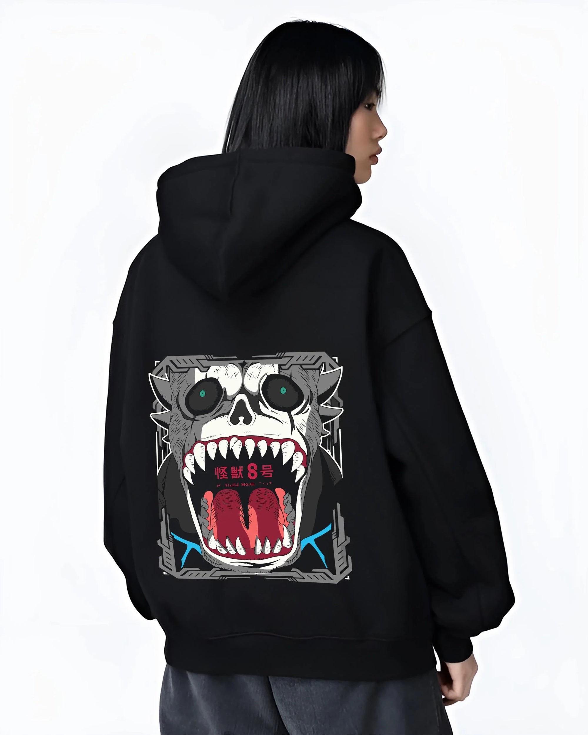 Black hoodie worn by female model, back view with Kikoru Shinomiya Hoodie Kaiju No. 8 Defense Force graphic bold anime graphic.