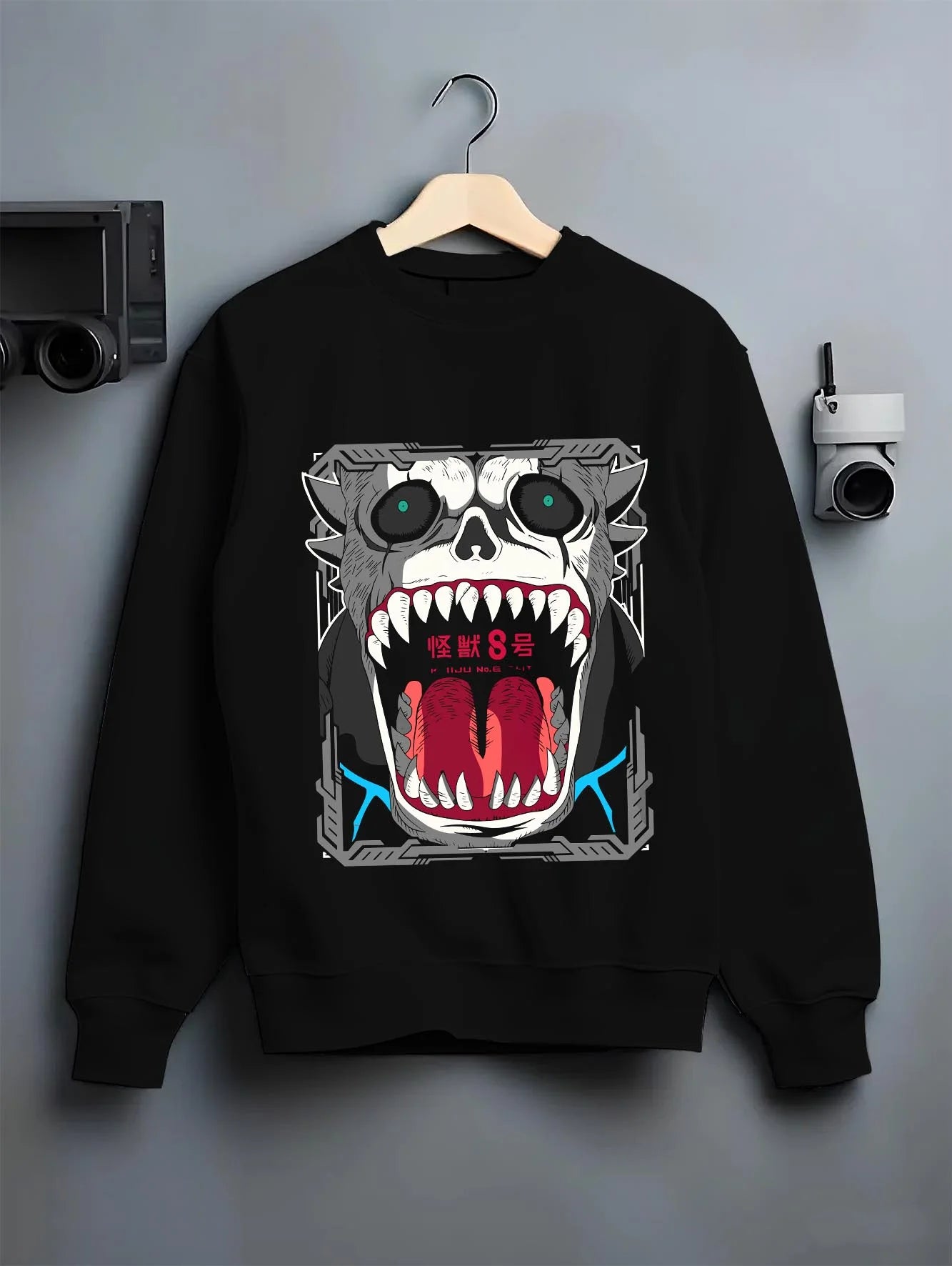 Black crewneck sweatshirt on hanger with Kikoru Shinomiya Hoodie Kaiju No. 8 Defense Force graphic streetwear graphic.
