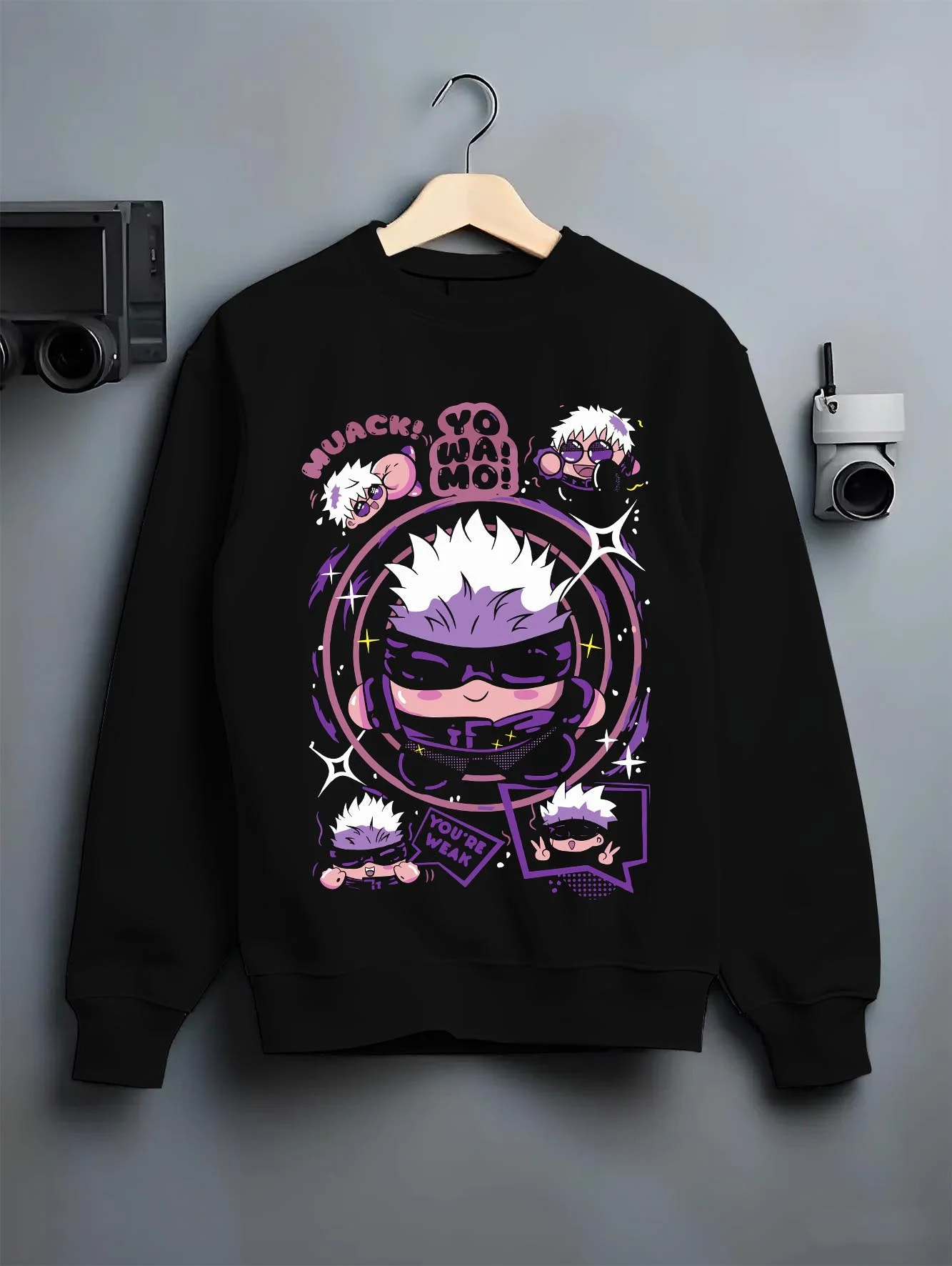 Black crewneck sweatshirt on hanger with Gojo Satoru Hoodie Jujutsu Kaisen Chibi Funny Faces graphic bold anime graphic.