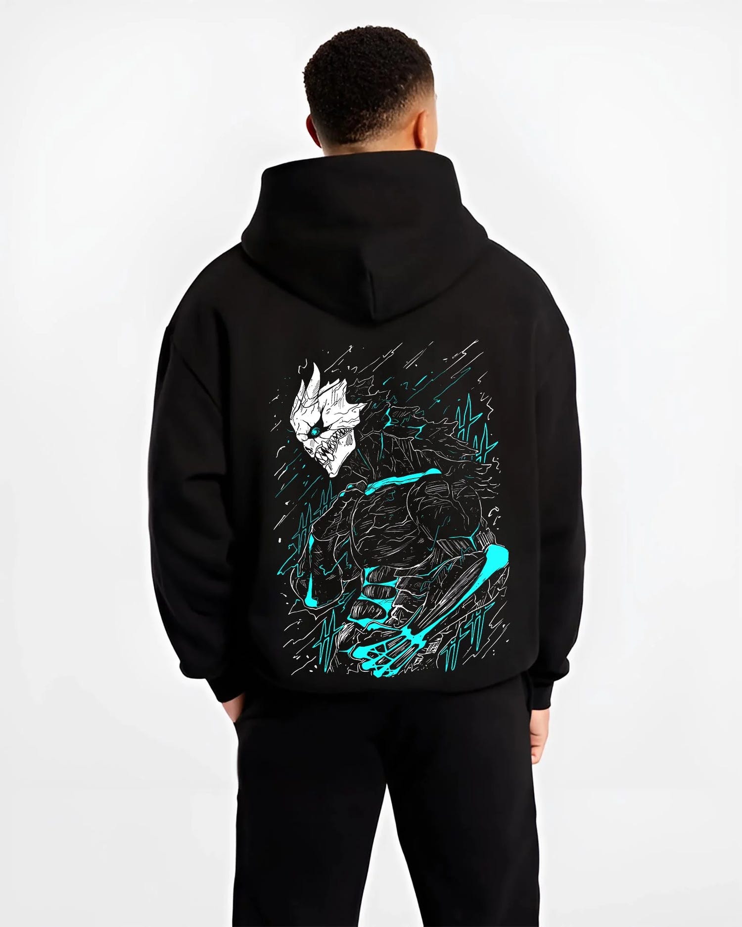 Black hoodie worn by male model, back view with Kaiju No. 8 Hoodie Kafka Hibino Monster Transformation graphic bold anime graphic.