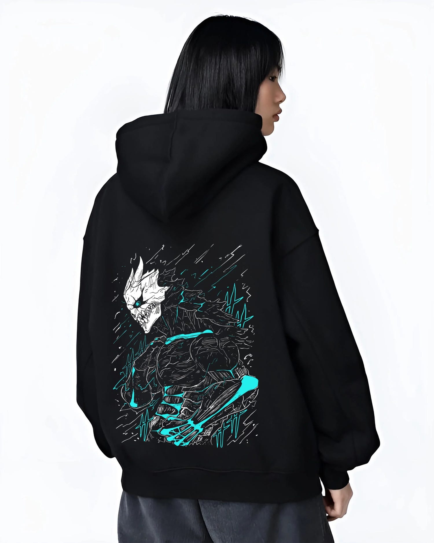 Black hoodie worn by female model, back view with Kaiju No. 8 Hoodie Kafka Hibino Monster Transformation graphic streetwear graphic.