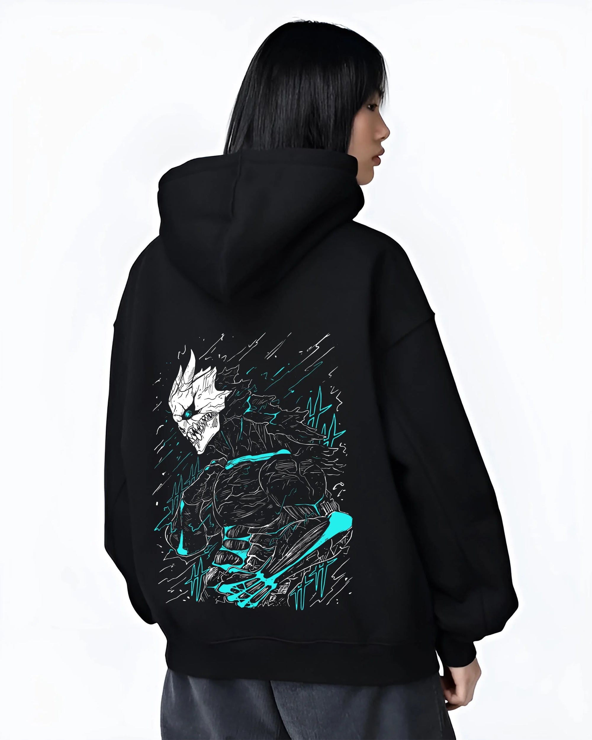 Black hoodie worn by female model, back view with Kaiju No. 8 Hoodie Kafka Hibino Monster Transformation graphic streetwear graphic.