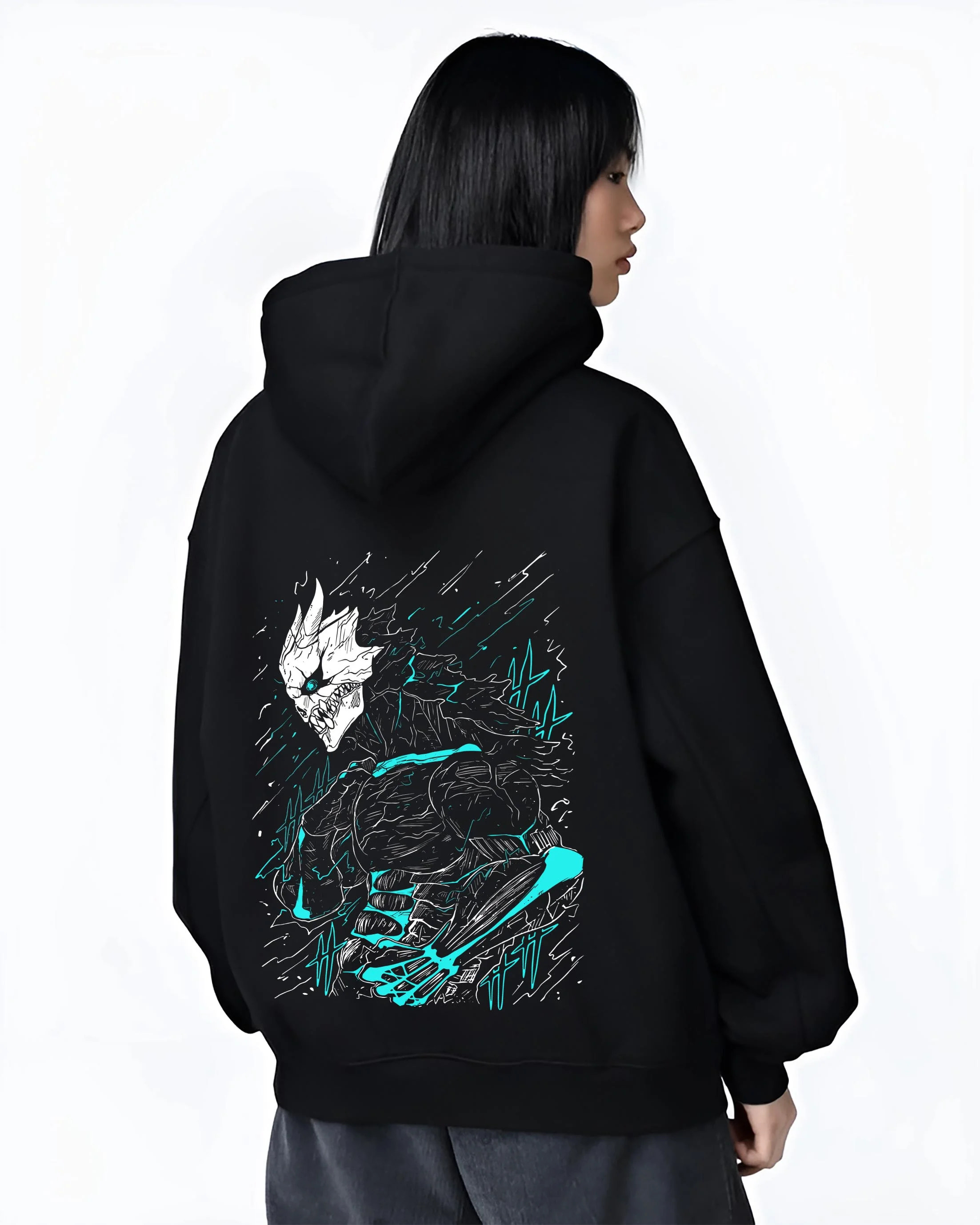 Black hoodie worn by female model, back view with Kaiju No. 8 Hoodie Kafka Hibino Monster Transformation graphic streetwear graphic.