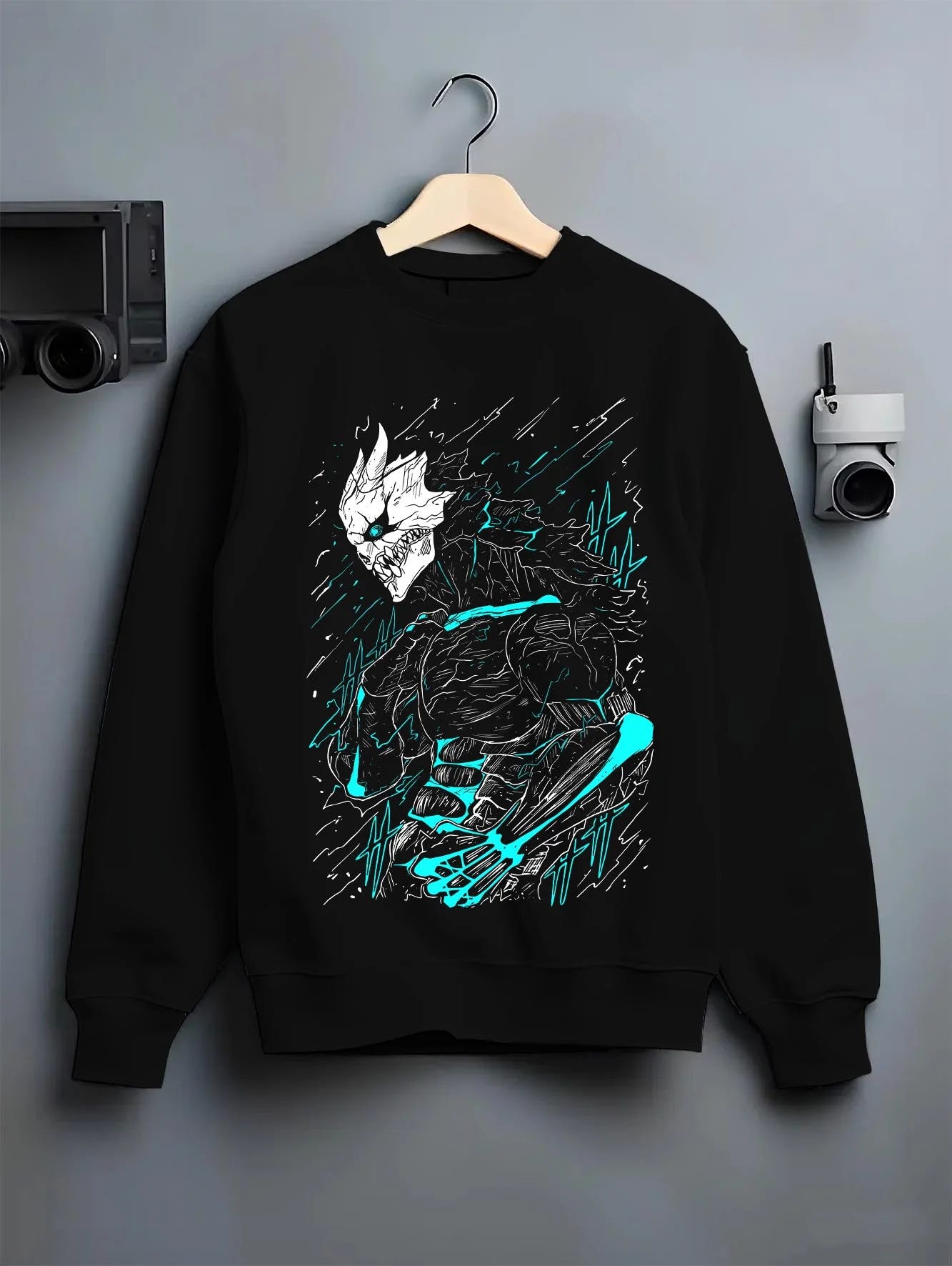 Black crewneck sweatshirt on hanger with Kaiju No. 8 Hoodie Kafka Hibino Monster Transformation graphic premium wear.