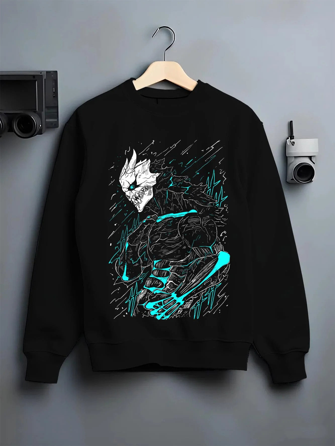 Black crewneck sweatshirt on hanger with Kaiju No. 8 Hoodie Kafka Hibino Monster Transformation graphic premium wear.