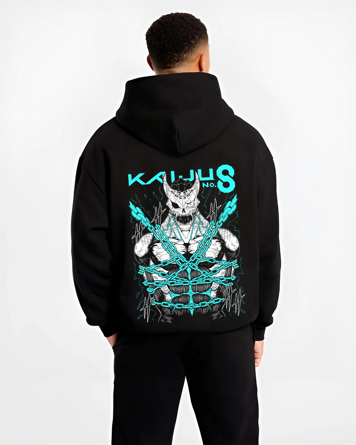 Black hoodie worn by male model, back view with Kaiju No. 8 Hoodie Kaiju Battle Transformation Form graphic streetwear graphic.