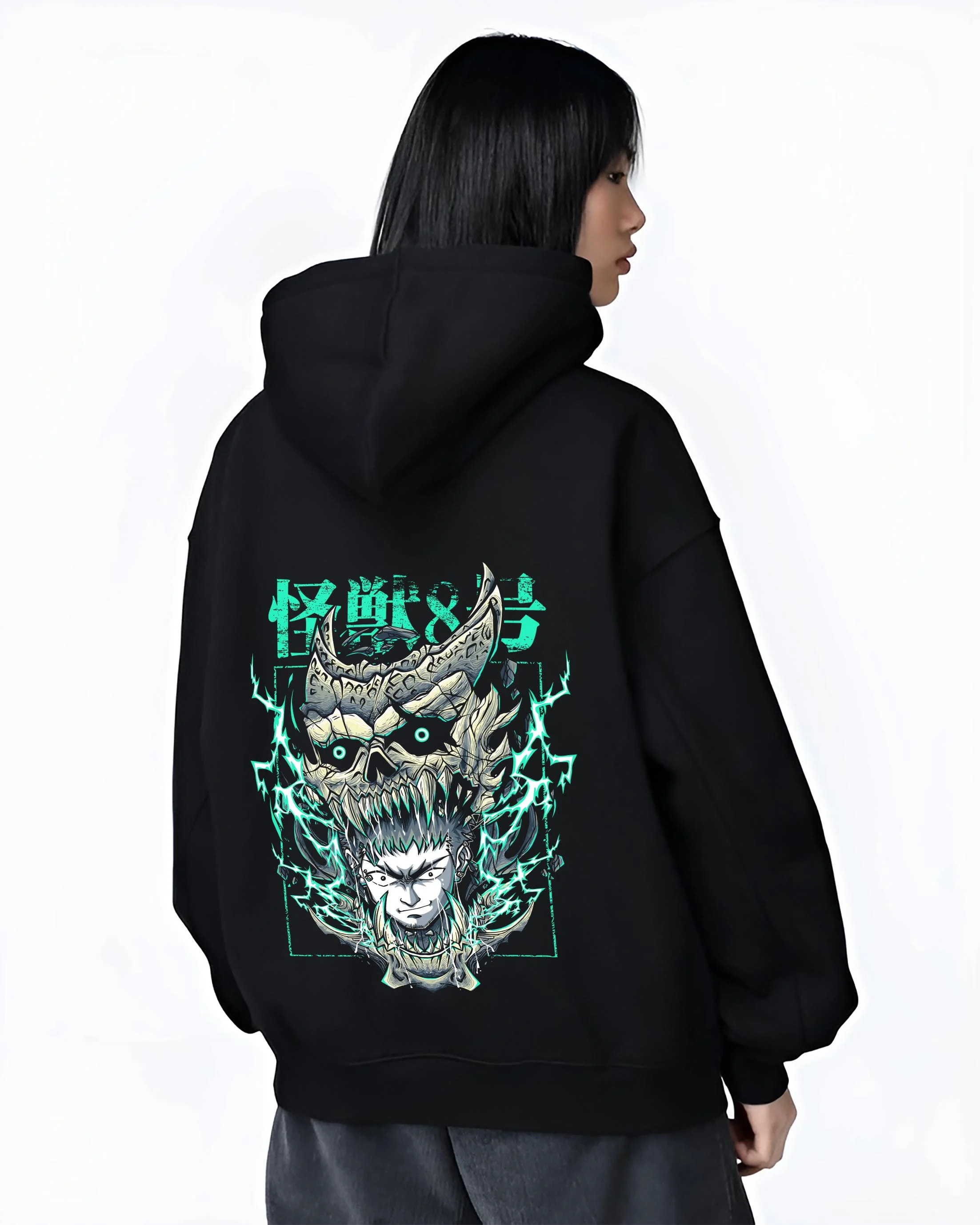 Black hoodie worn by female model, back view with Kaiju No. 8 Hoodie Kafka Hibino Fiery Skull Form graphic streetwear graphic.