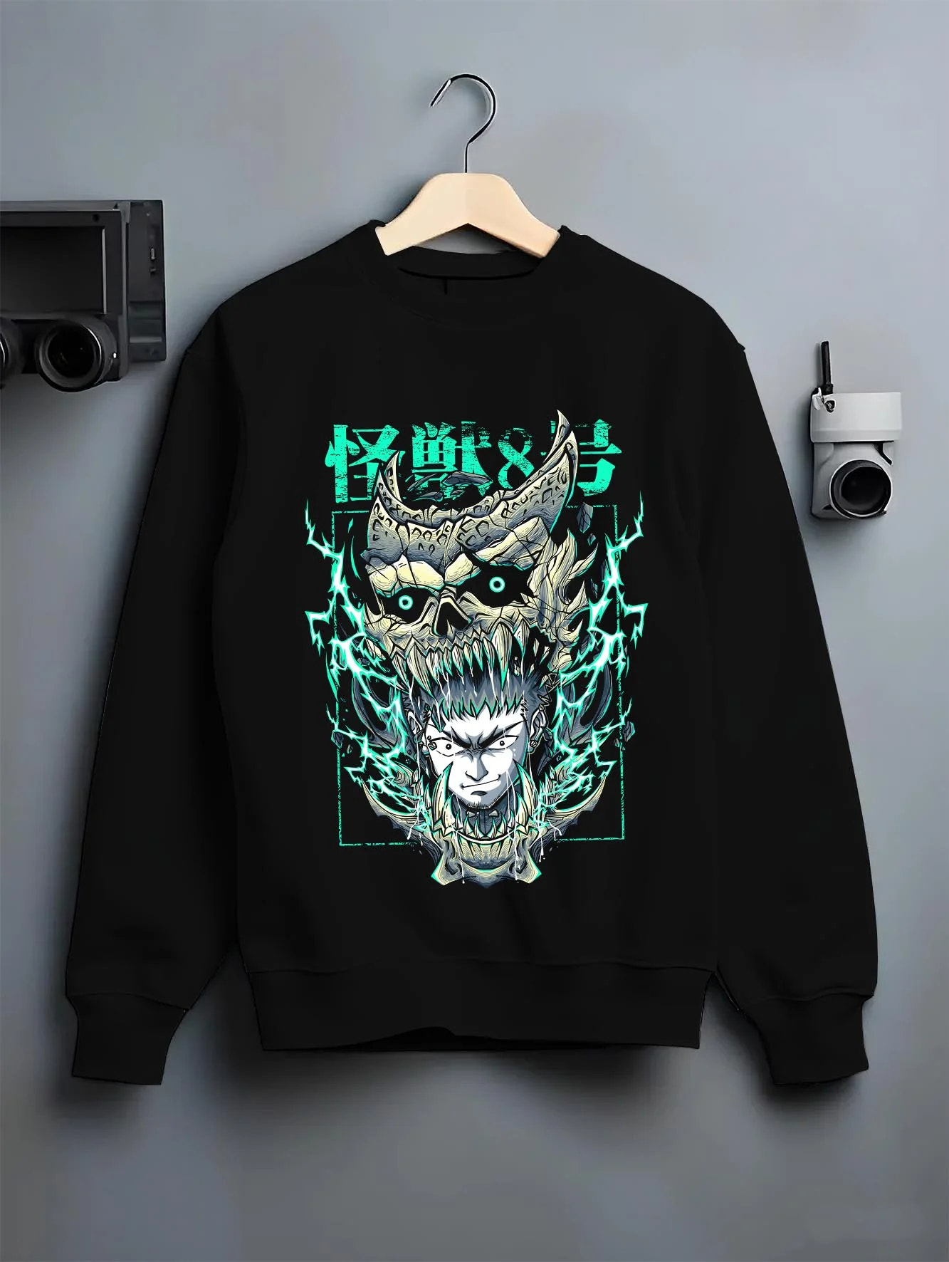 Black crewneck sweatshirt on hanger with Kaiju No. 8 Hoodie Kafka Hibino Fiery Skull Form graphic streetwear graphic.