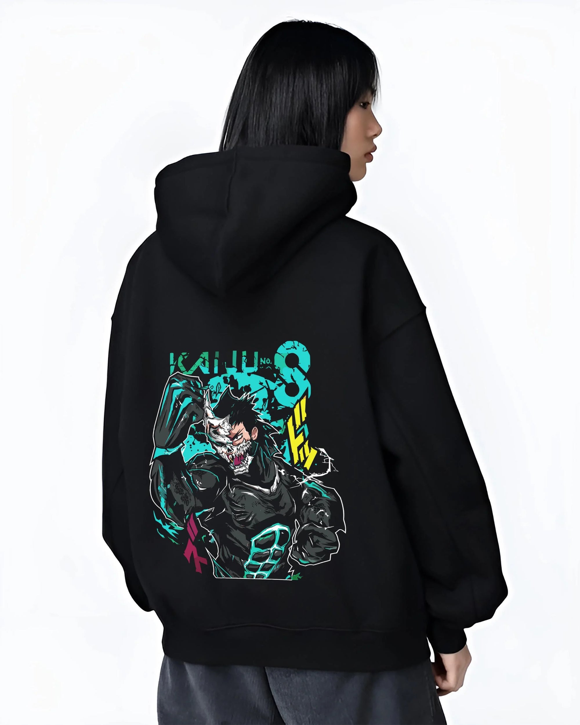 Black hoodie worn by female model, back view with Kaiju No. 8 Hoodie Kafka Hibino Beast Awakening graphic streetwear graphic.