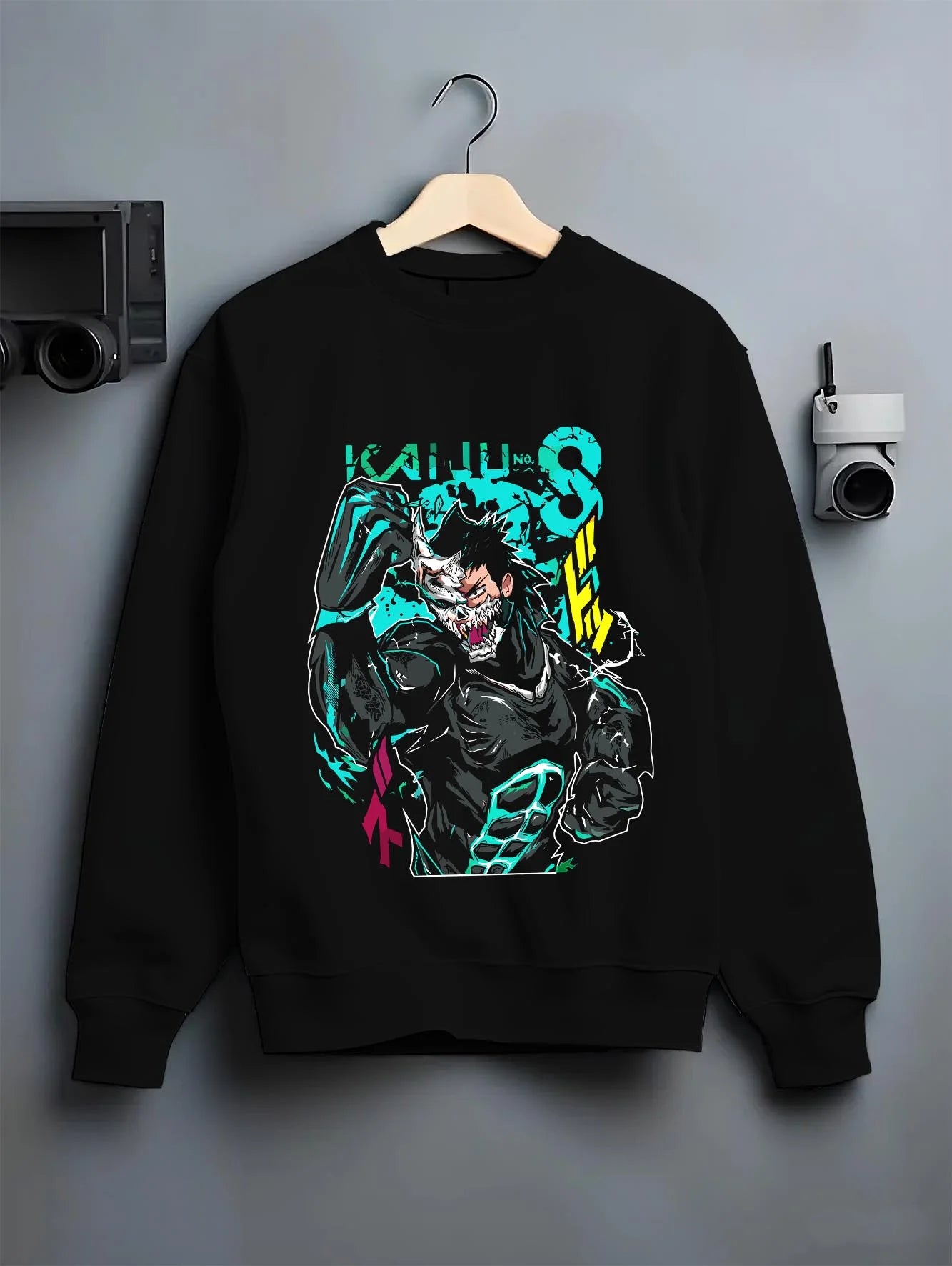 Black crewneck sweatshirt on hanger with Kaiju No. 8 Hoodie Kafka Hibino Beast Awakening graphic streetwear graphic.