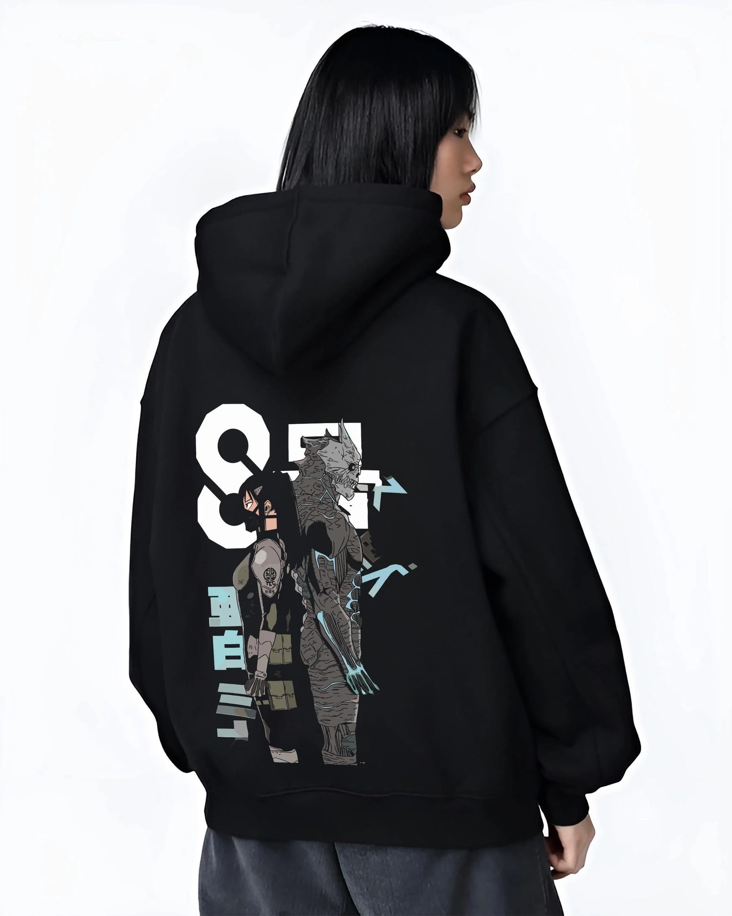 Black hoodie worn by female model, back view with Kaiju No. 8 Hoodie Final Form Heroic Moment graphic streetwear graphic.