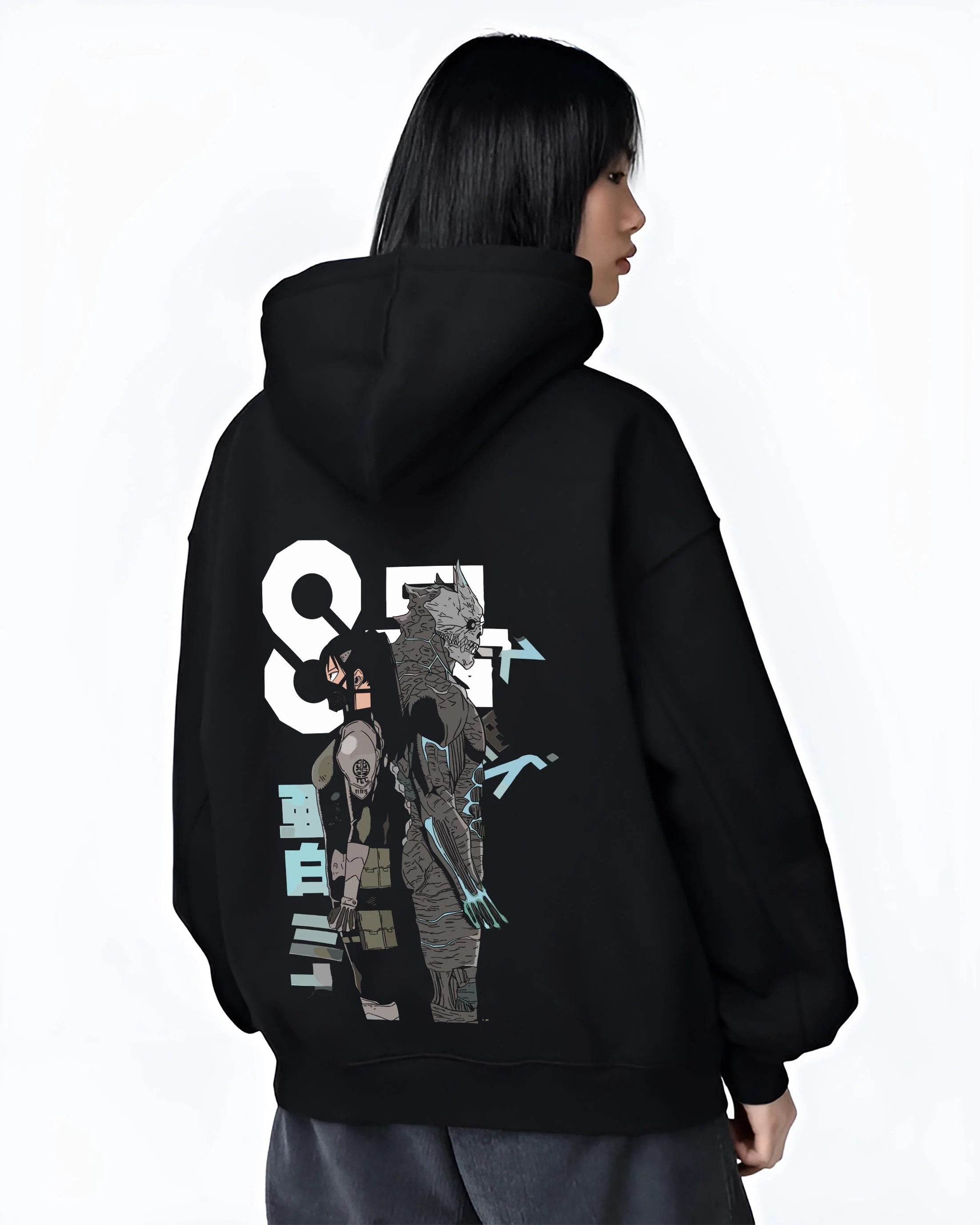 Black hoodie worn by female model, back view with Kaiju No. 8 Hoodie Final Form Heroic Moment graphic streetwear graphic.