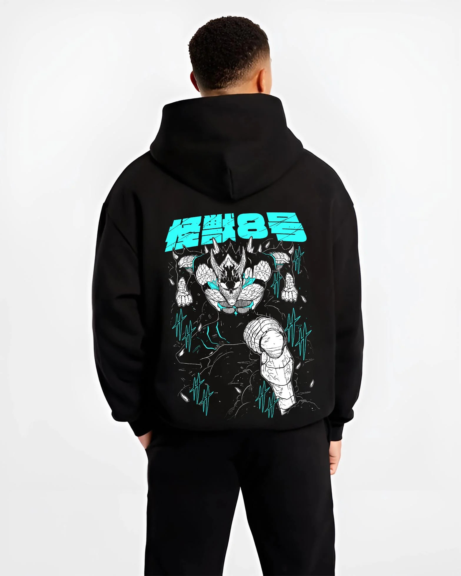 Black hoodie worn by male model, back view with Kaiju No. 8 Hoodie Monstrous Power Surge Pose graphic bold anime graphic.